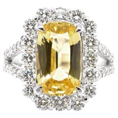 5.46 Carat Natural Yellow Sapphire and Diamond Ring Set in Platinum