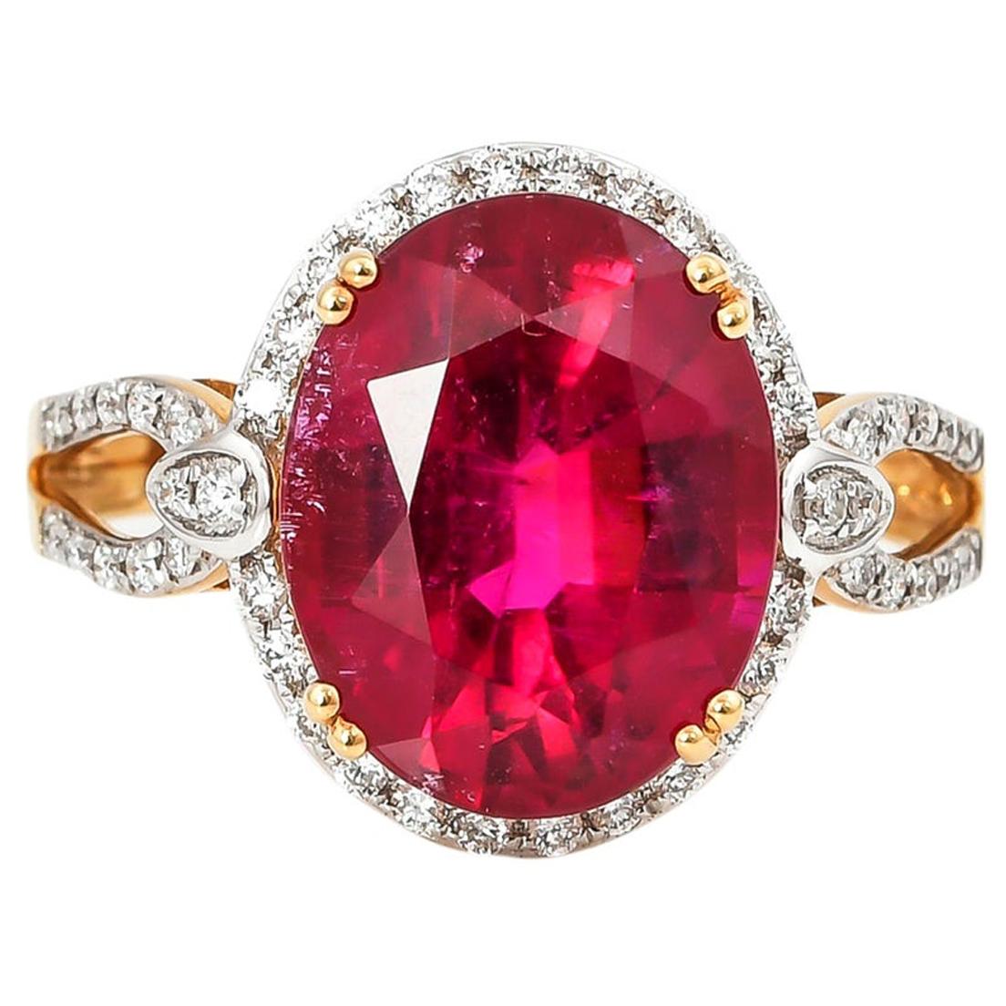 5.46 Carat Oval Shaped Rubelite Ring in 18 Karat Yellow Gold with Diamonds