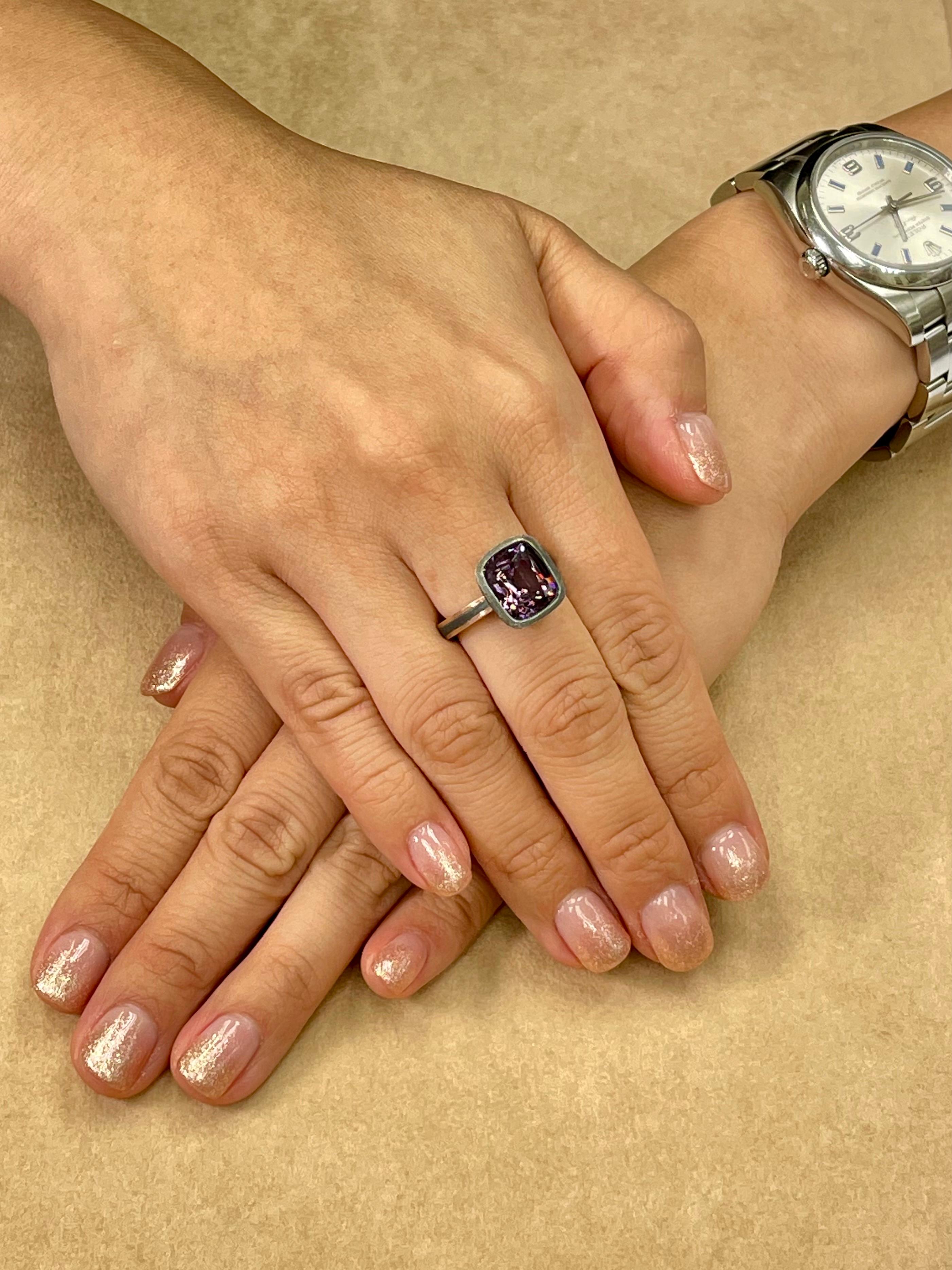 Please check out the HD video. Not much to say except it is a wonderfully unique purple Spinel ring. The ring is set in 18k gold and 925 silver. The Natural Spinel is well cut. The color is crispy. The spinel is almost loupe clean. The ring is full