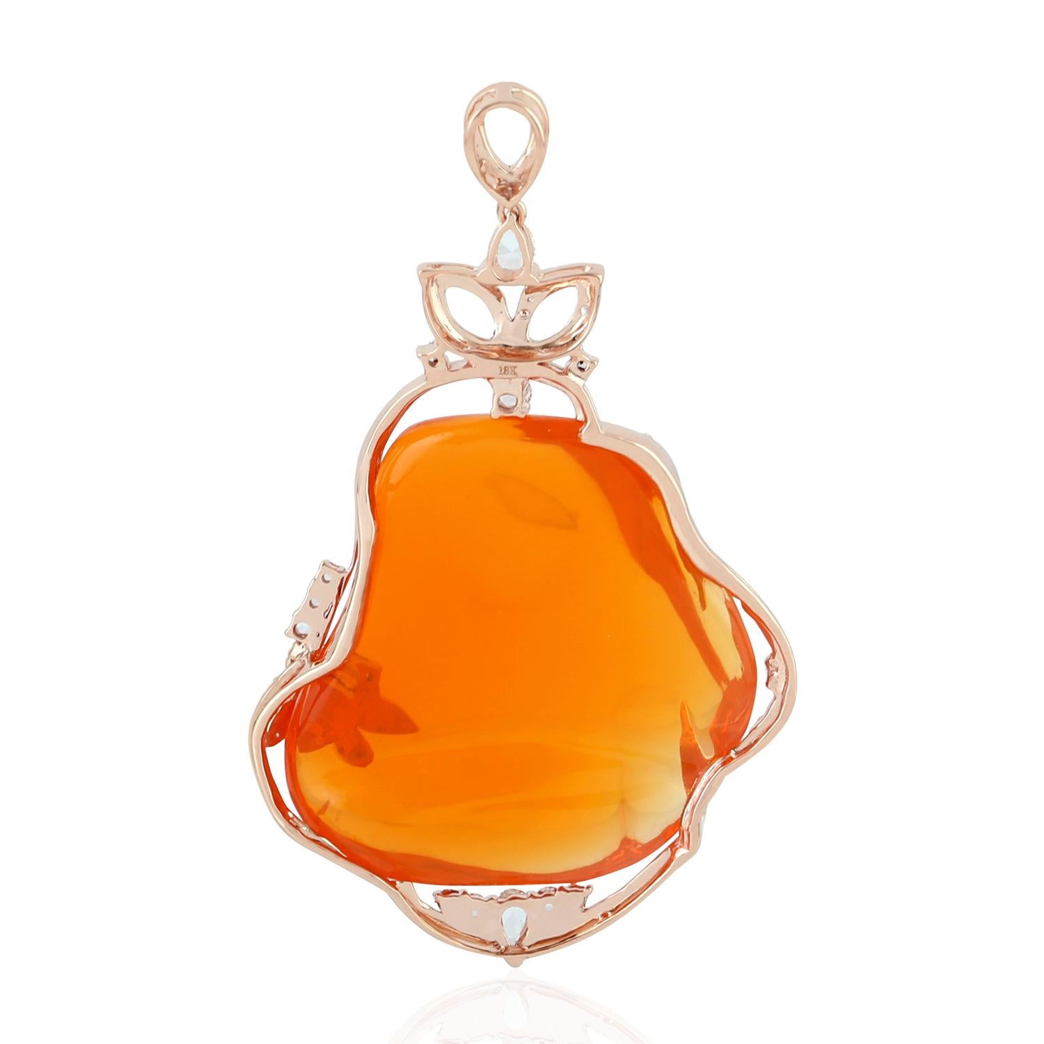 Cast in 18 Karat gold, this beautiful pendant features 54.64 carats of fire opal & 1.4 carats of sparkling diamonds.  

FOLLOW  MEGHNA JEWELS storefront to view the latest collection & exclusive pieces.  Meghna Jewels is proudly rated as a Top