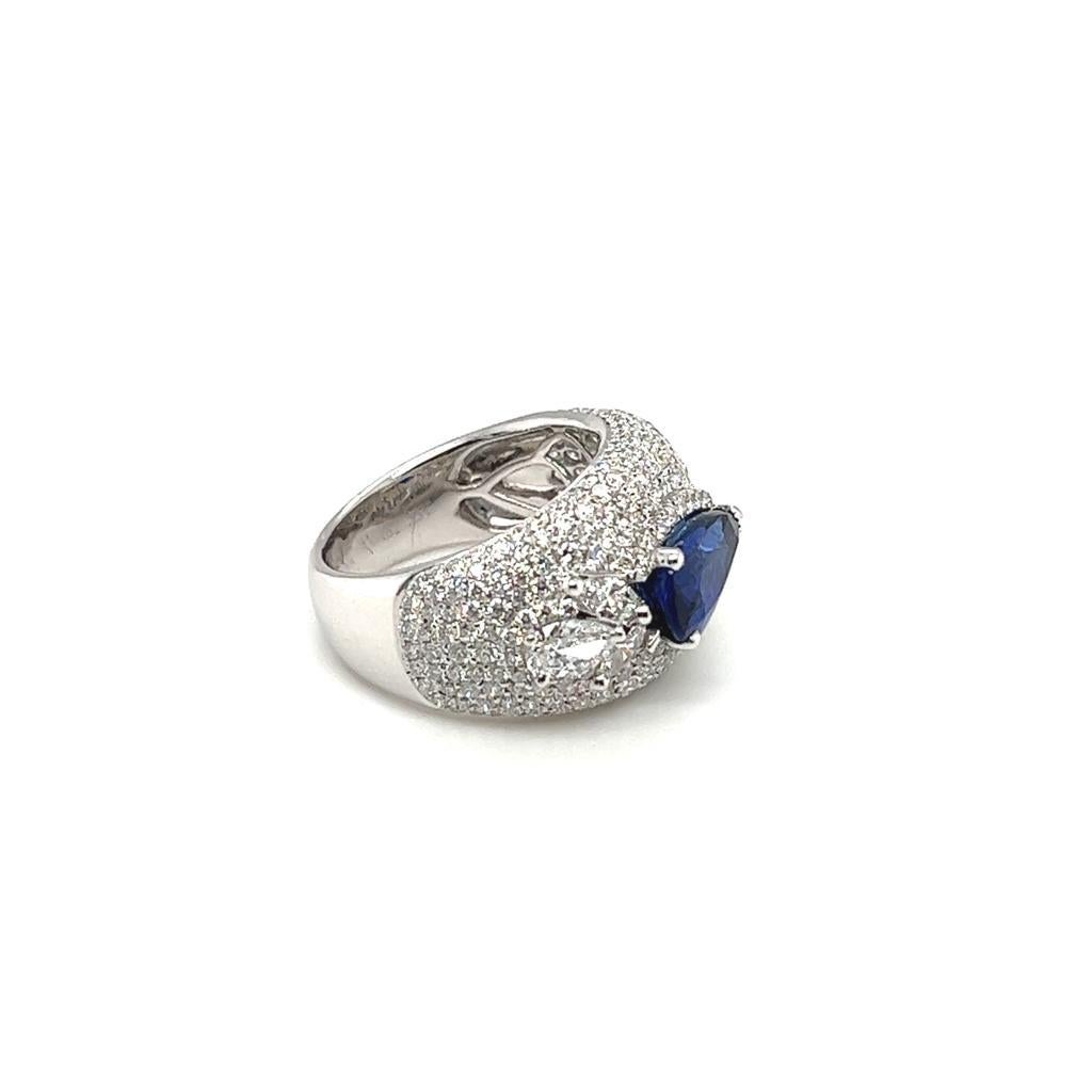 Pear Cut 5.47 Carat Sapphire and Diamond Ring Set on 18 Karat White Gold For Sale