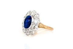 5.48 Carat Oval Cut Sapphire & 3.30 Carat Diamond Cluster Ring