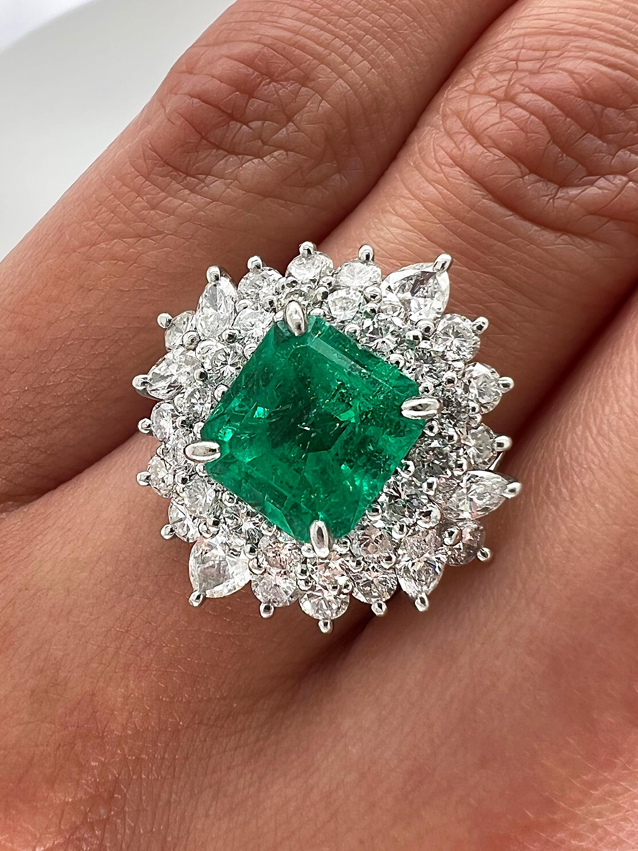 Women's or Men's 5.48 Total Carat Emerald and Diamond Halo Ladies Ring For Sale