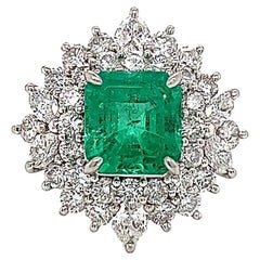 5.48 Total Carat Emerald and Diamond Halo Ladies Ring