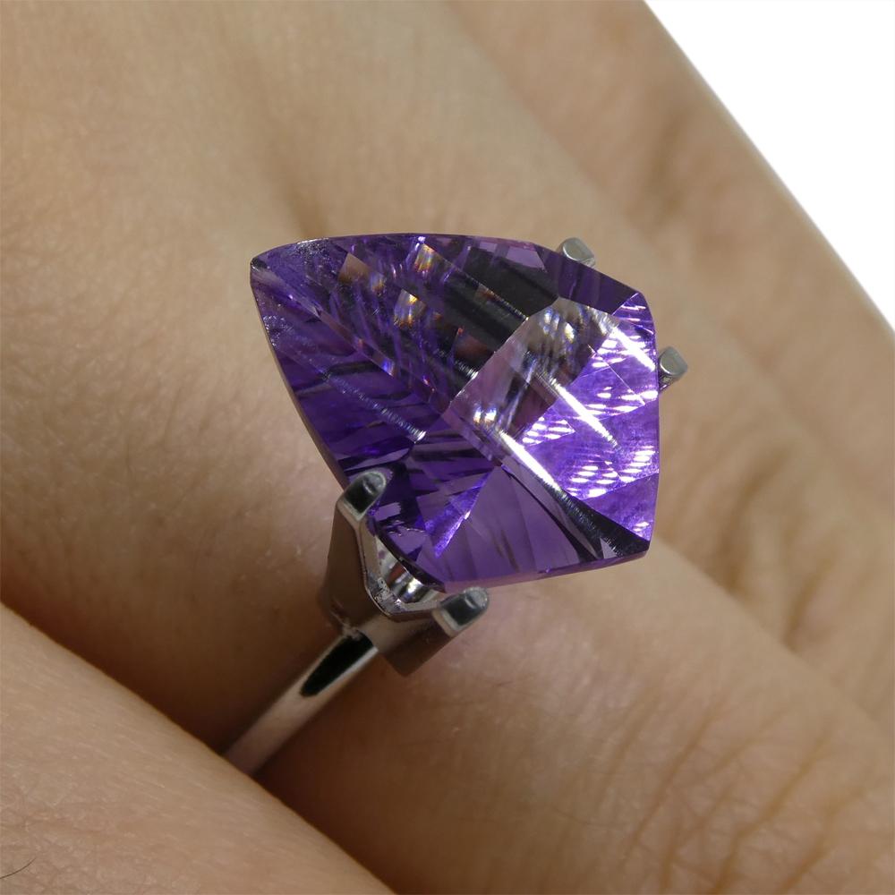 Description:

Gem Type: Amethyst
Number of Stones: 1
Weight: 5.48 cts
Measurements: 16.00 x 12.00 x 7.60 mm
Shape: Shield
Cutting Style Crown: Modified Brilliant
Cutting Style Pavilion: Mixed Cut
Transparency: Transparent
Clarity: Very Slightly
