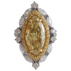 5.49 Carat Natural Yellow Marquise And White Diamond Ring In 18 K White Gold.