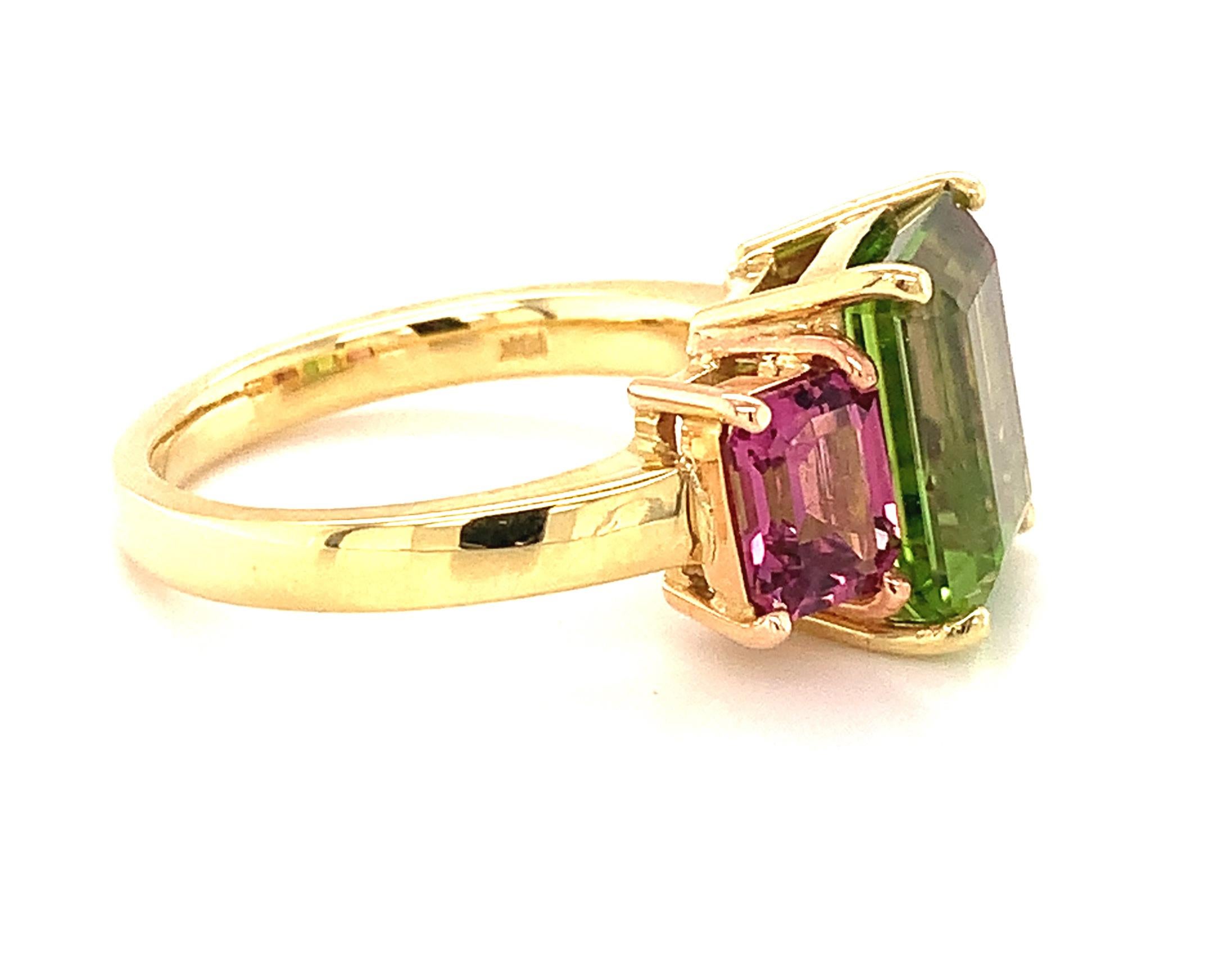 Emerald Cut 5.49 Carat Peridot and Rhodolite Garnet Three-Stone Ring in Yellow and Rose Gold For Sale
