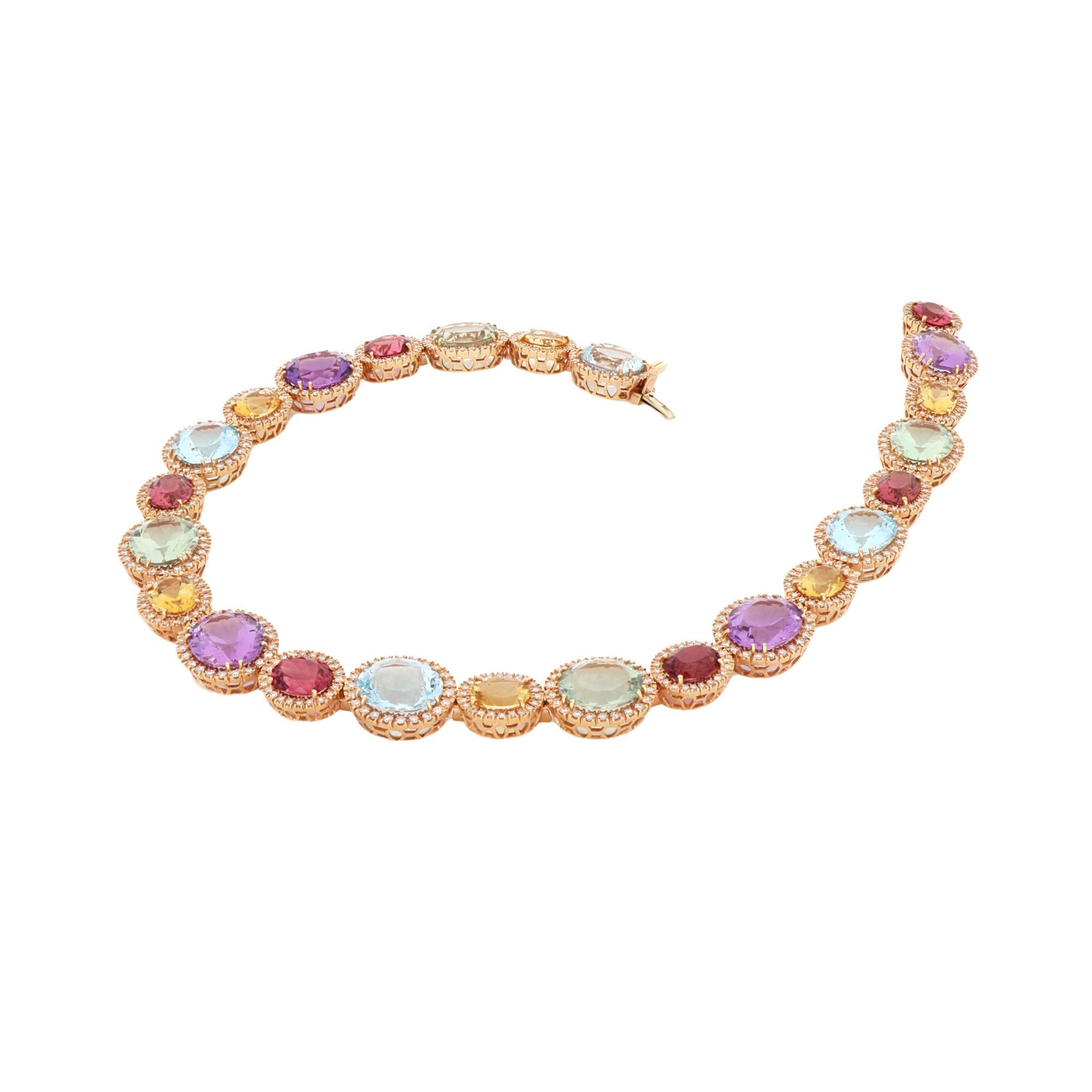 Add sparkle and a touch of color to your wardrobe with our dazzling multi-gemstone necklace. Crafted in 18kt red gold, this eye-catching necklace features an array of multi-colored gemstones that lend a vibrant rainbow effect.
It features 6 citrine