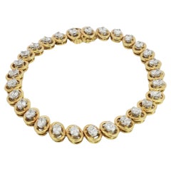 Bracciale tennis con diamanti da 5,4 carati in oro giallo 18 carati e platino con diamanti taglio ovale VS