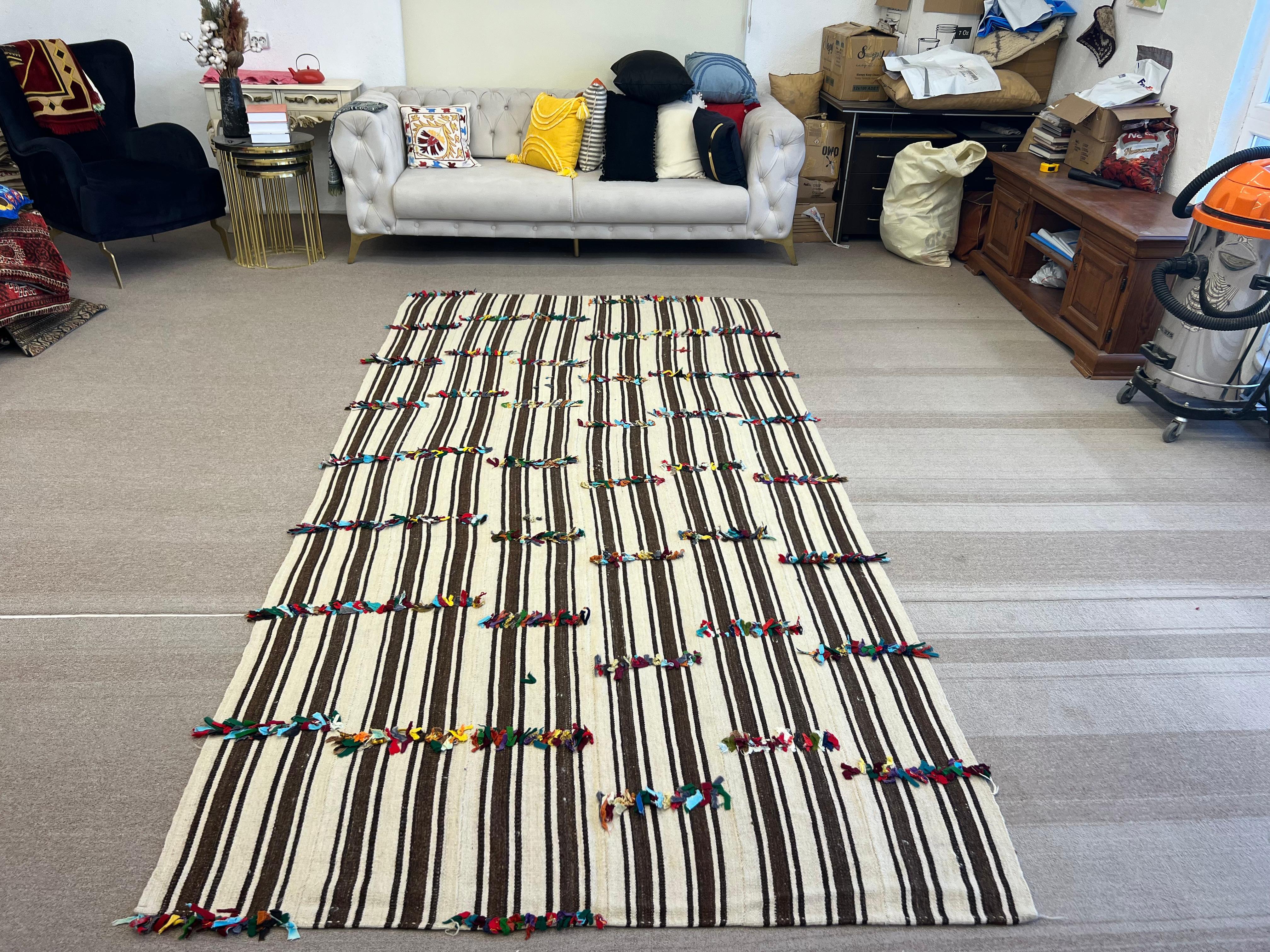 5.4x10.7 Ft Hand Woven Striped Turkish Natural Wool Kilim Rug with Colorful Poms In Good Condition For Sale In Spring Valley, NY