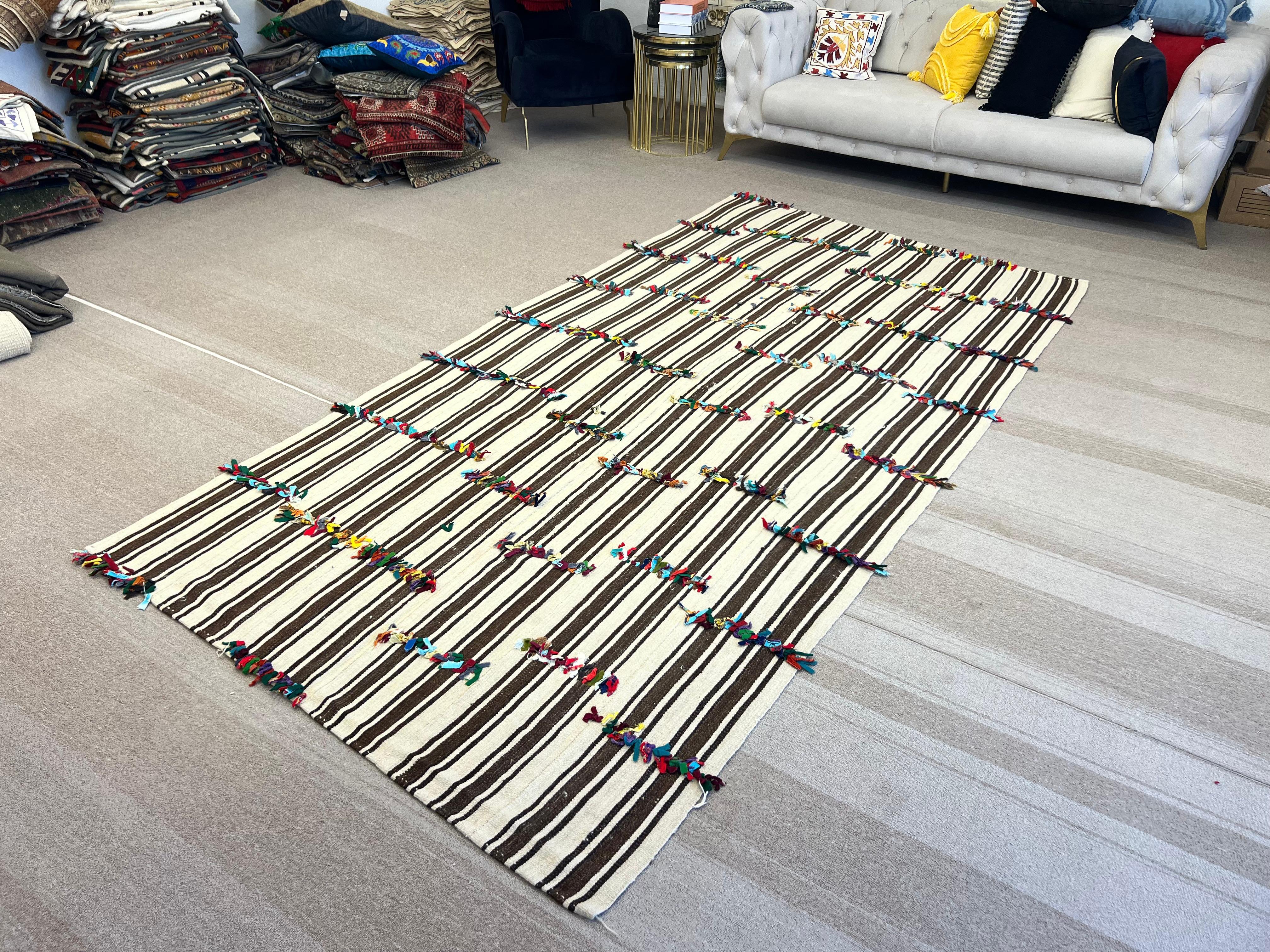 Late 20th Century 5.4x10.7 Ft Hand Woven Striped Turkish Natural Wool Kilim Rug with Colorful Poms For Sale