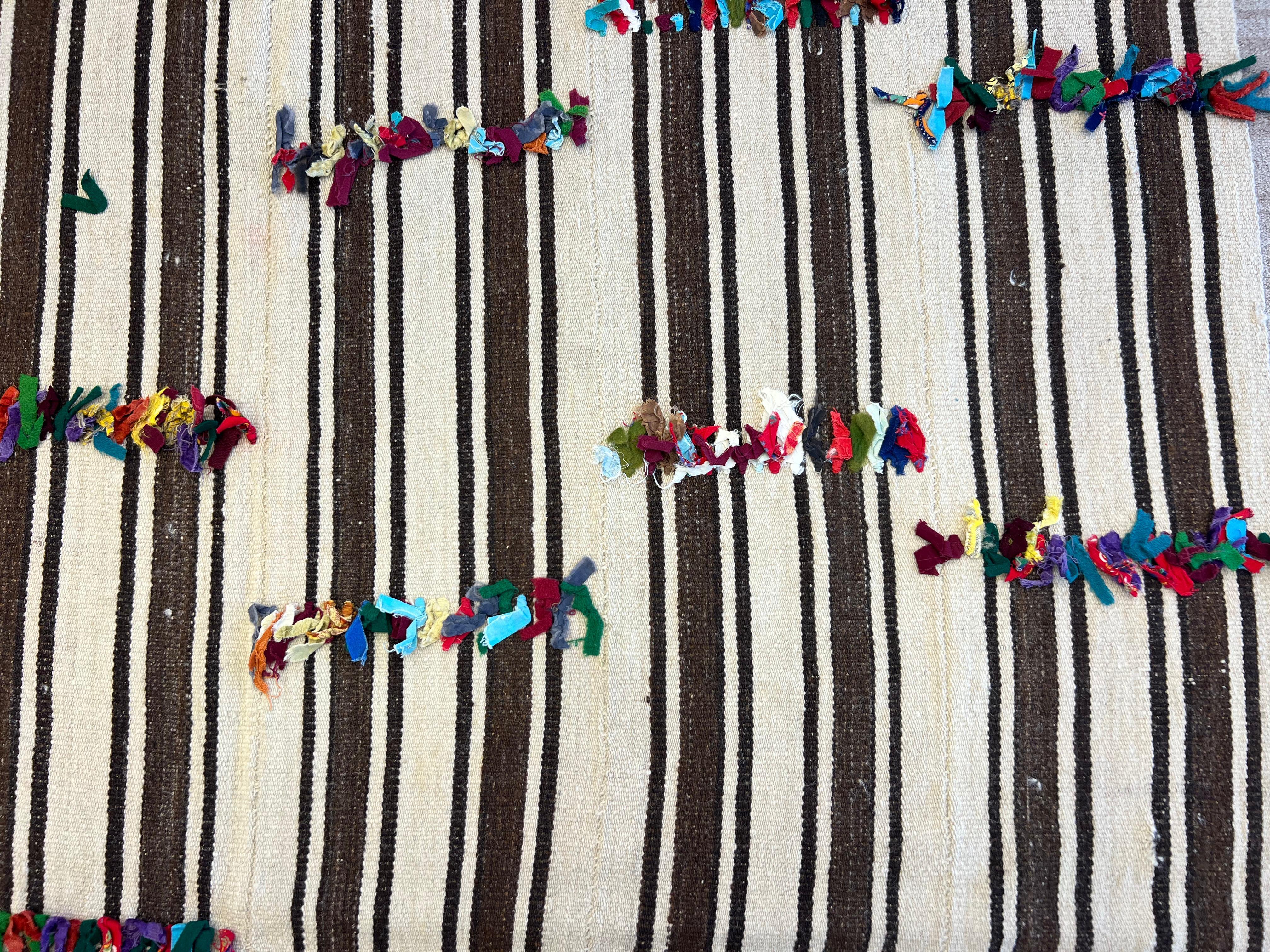 5.4x10.7 Ft Hand Woven Striped Turkish Natural Wool Kilim Rug with Colorful Poms For Sale 1