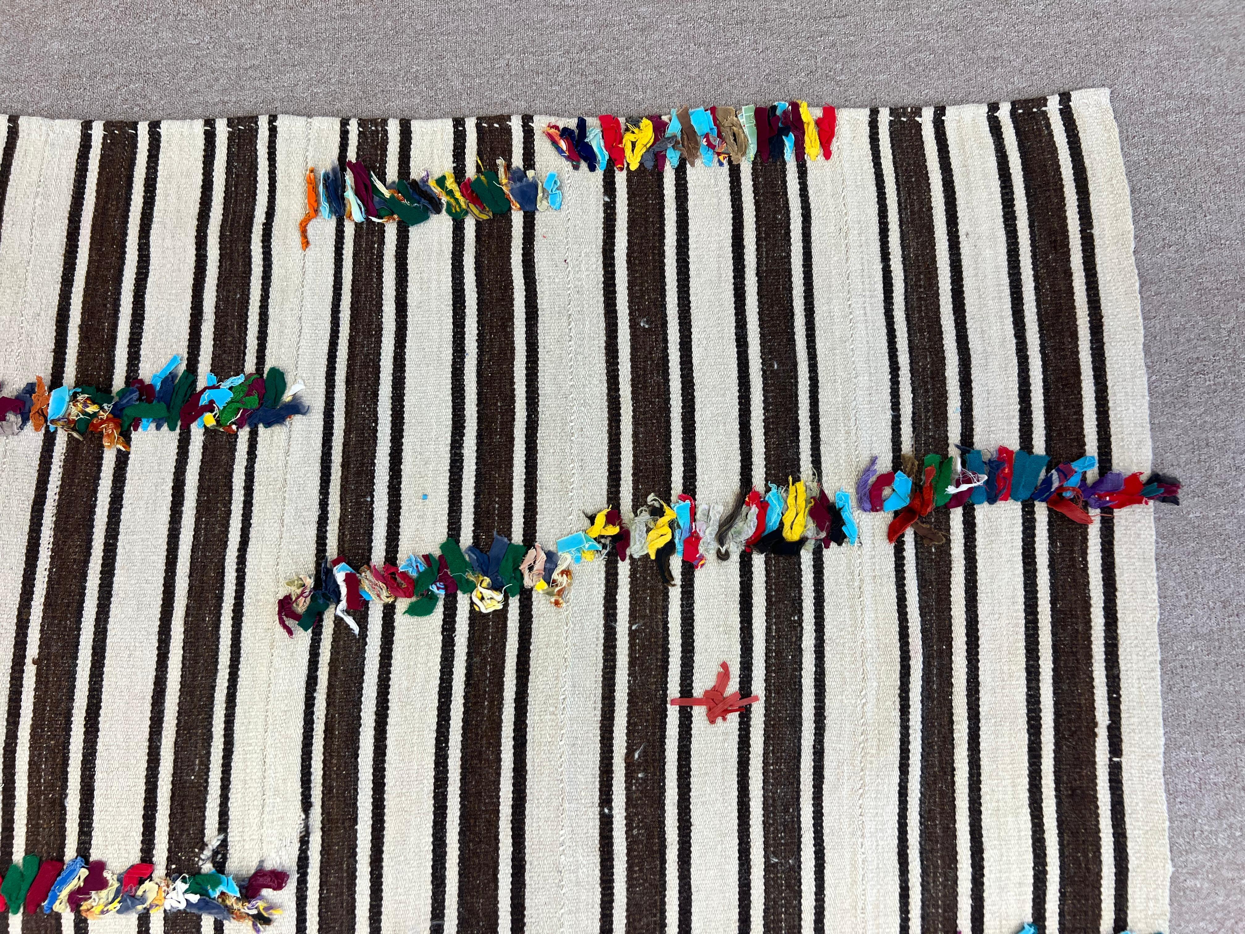 5.4x10.7 Ft Hand Woven Striped Turkish Natural Wool Kilim Rug with Colorful Poms For Sale 3