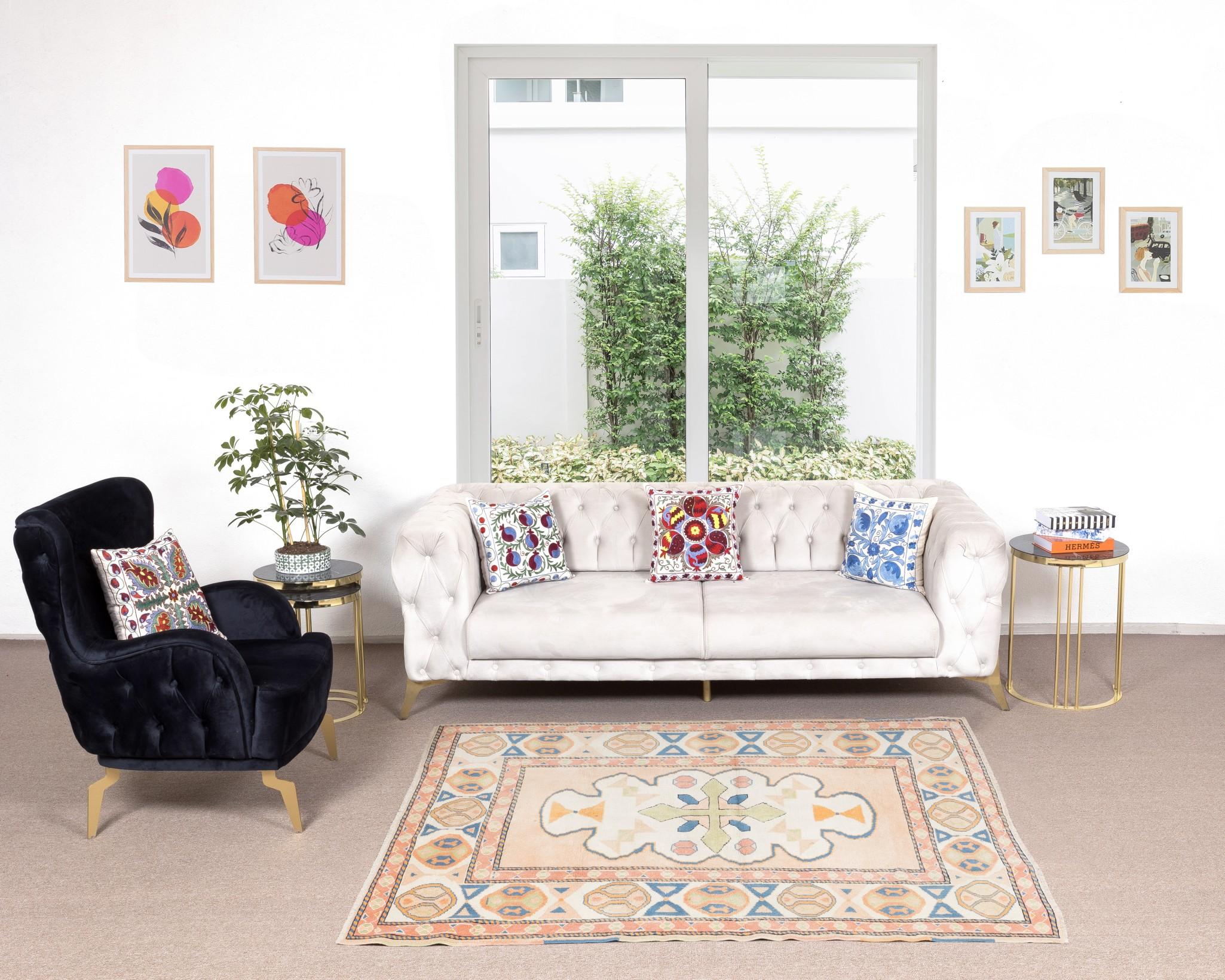 A hand-knotted contemporary Turkish rug.

This modern rug has even medium wool pile on wool foundation.

It is made of premium hand-spun sheep and natural dyes, ie. plant based non chemical dyes making it sought after, rare and special. 

The colors