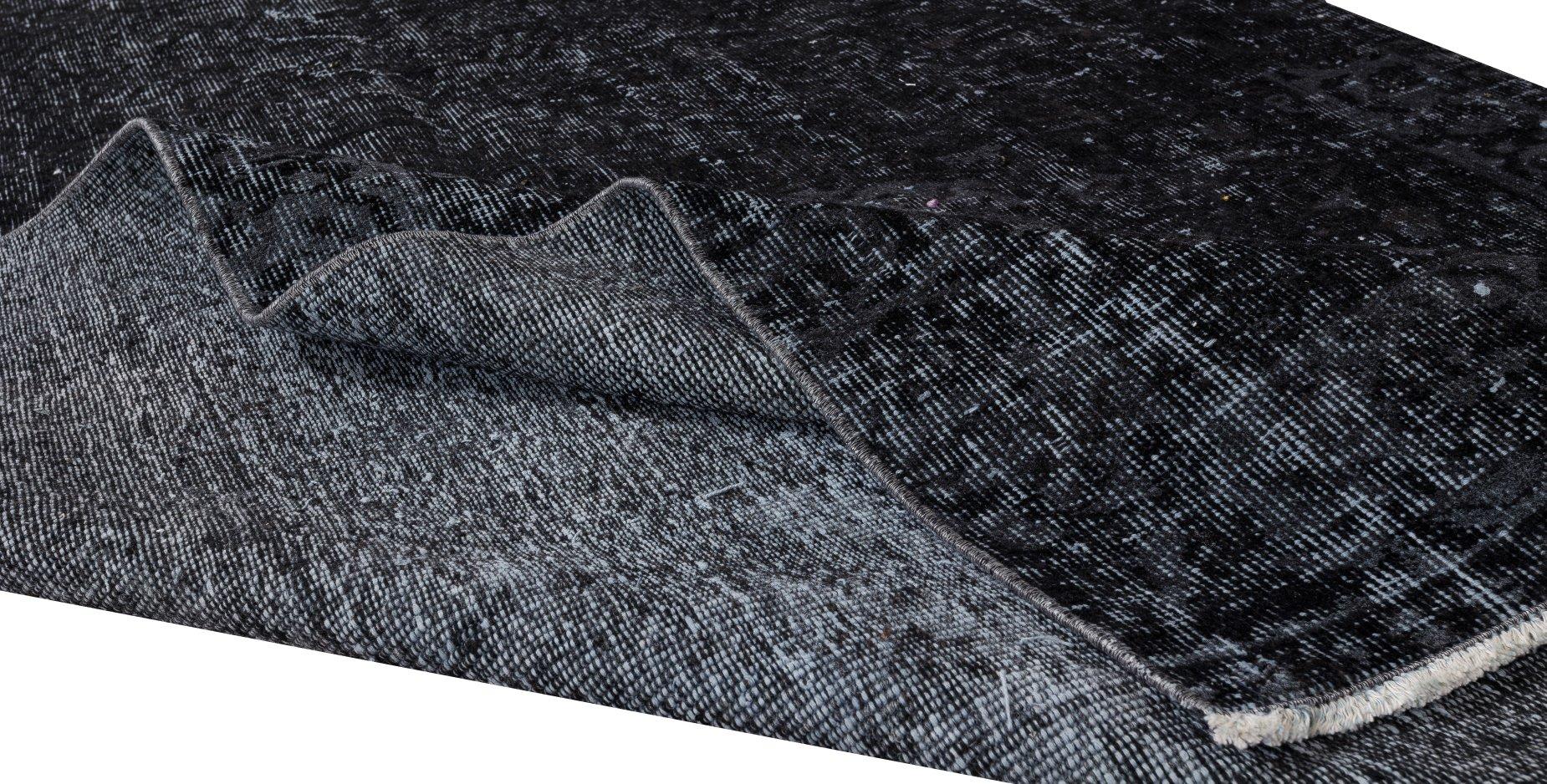 plain black rug