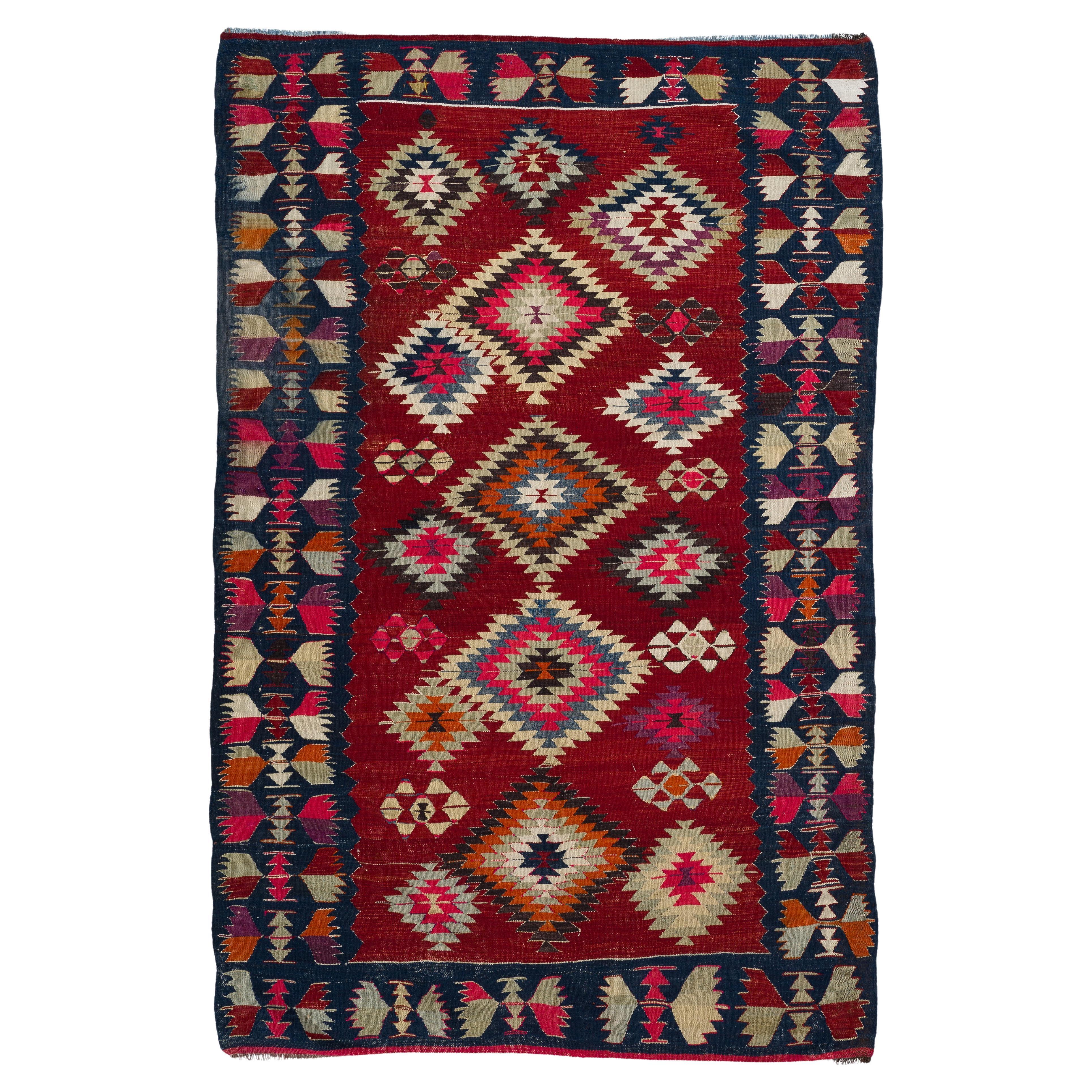 5.4x8.5 ft Hand Woven Turkish Kilim Rug with Geometric Design in Red and Indigo For Sale
