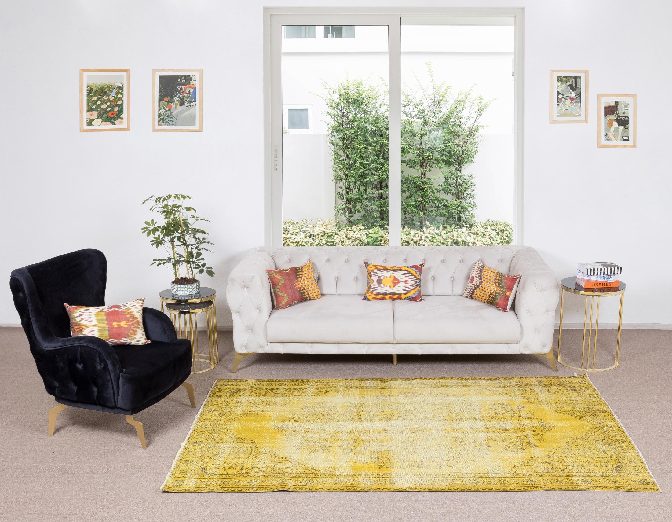 Our yellow over-dyed rugs are all hand-knotted vintage pieces that are recreated in our workshop to cater to a wider range of interior design choices from modern to coastal, from industrial to rustic/cottage. These 50 to 70 year-old rugs were