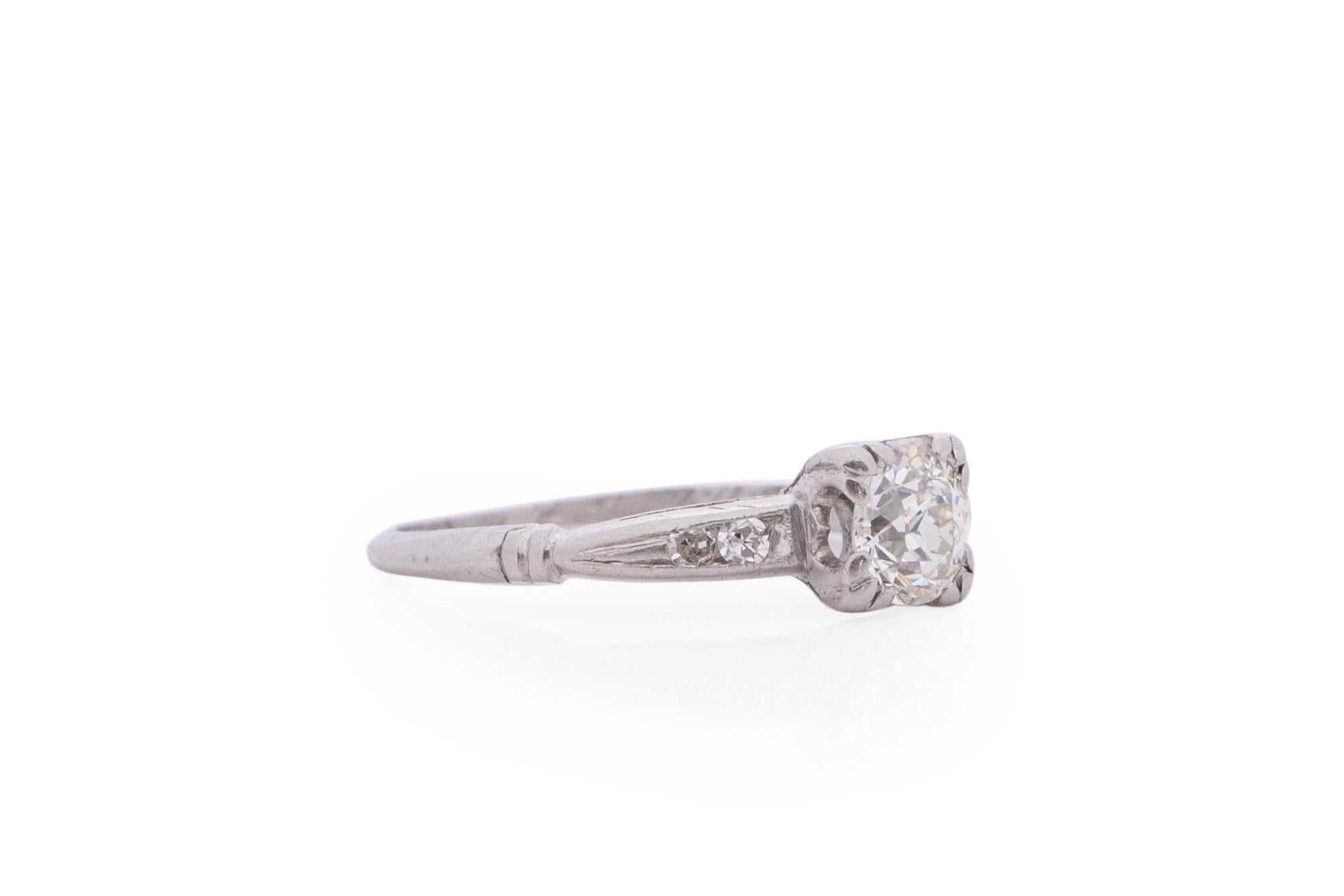 Item Details: 
Ring Size: 5.25
Metal Type: Platinum [Hallmarked, and Tested]
Weight: 3.0 grams

Center Diamond Details:
Weight: .55 carat
Cut: Old European brilliant
Color: G
Clarity: VS

Side Stone Details:
Weight: .10 carat total weight
Cut: