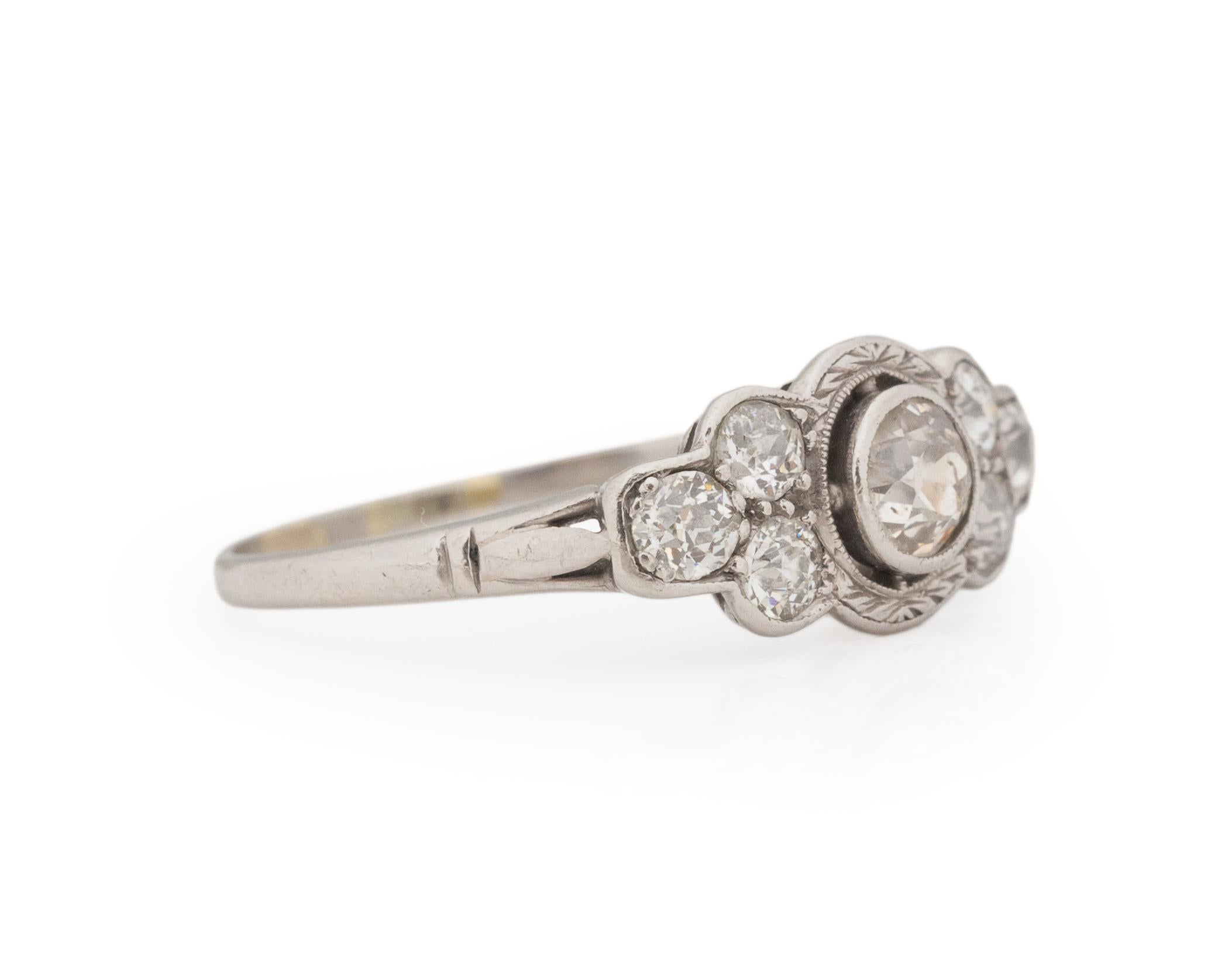 Ring Size: 9
Metal Type: Platinum [Hallmarked, and Tested]
Weight: 4.1 grams

Center Diamond Details: 
Weight: .55ct
Cut: Old European brilliant
Color: I
Clarity: SI1

Side Stone Details:
Weight: .25ct, total weight
Cut: Antique European Cut
Color: