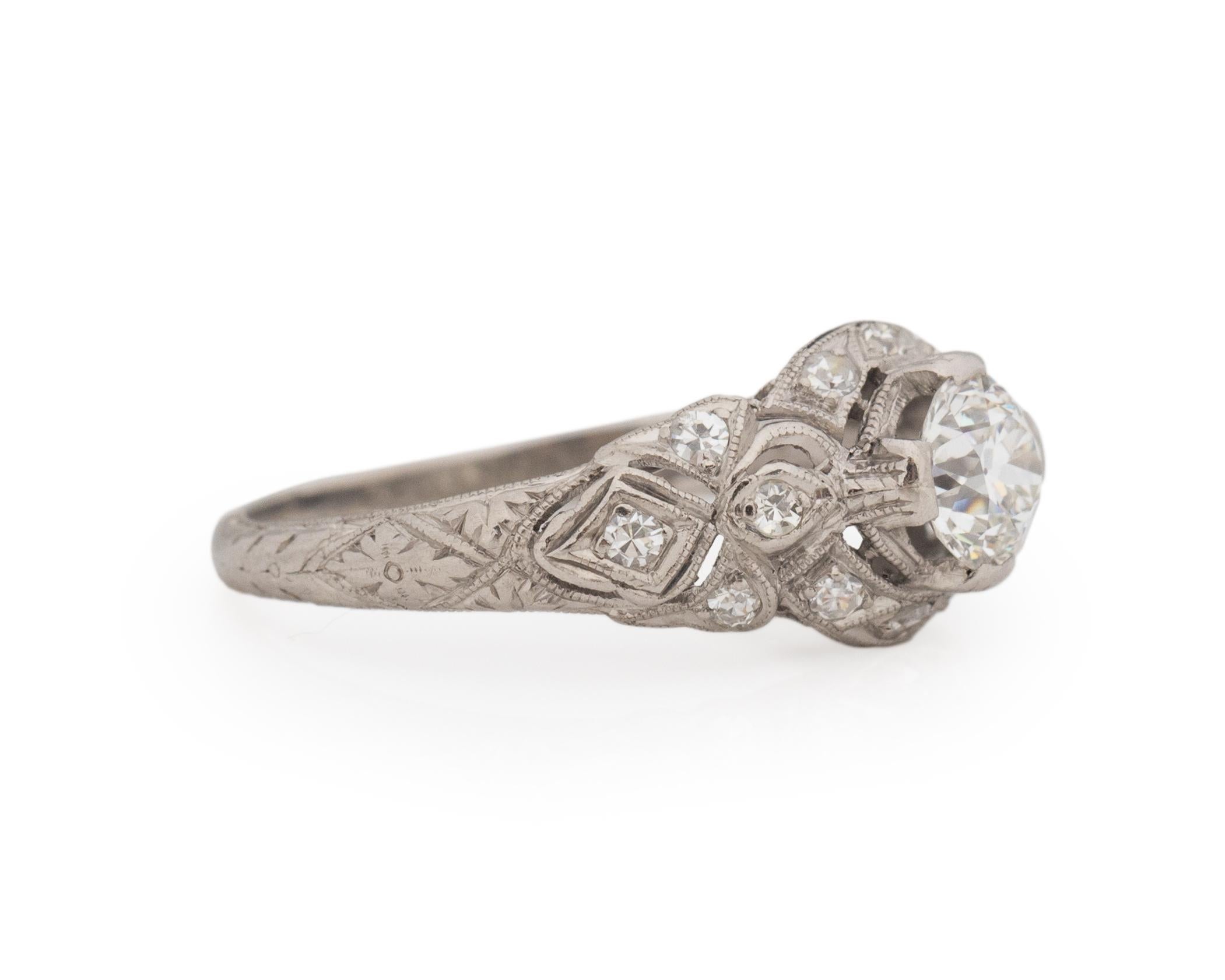 Ring Size: 4.75
Metal Type: Platinum [Hallmarked, and Tested]
Weight: 2.5 grams

Center Diamond Details:
Weight: .55ct
Cut: Old European brilliant
Color: H
Clarity: VS

Side Stone Details:
Weight: .15ct, total weight
Cut: Antique European Cut
Color: