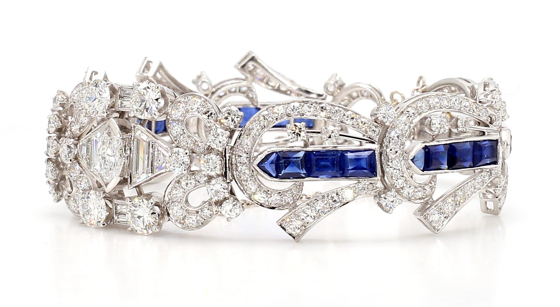 Le bracelet Art déco à diamants est un bijou éblouissant qui respire l'élégance et la sophistication intemporelles. Il présente des diamants éblouissants et de riches saphirs bleus sertis dans un platine lustré, créant ainsi un design luxueux et