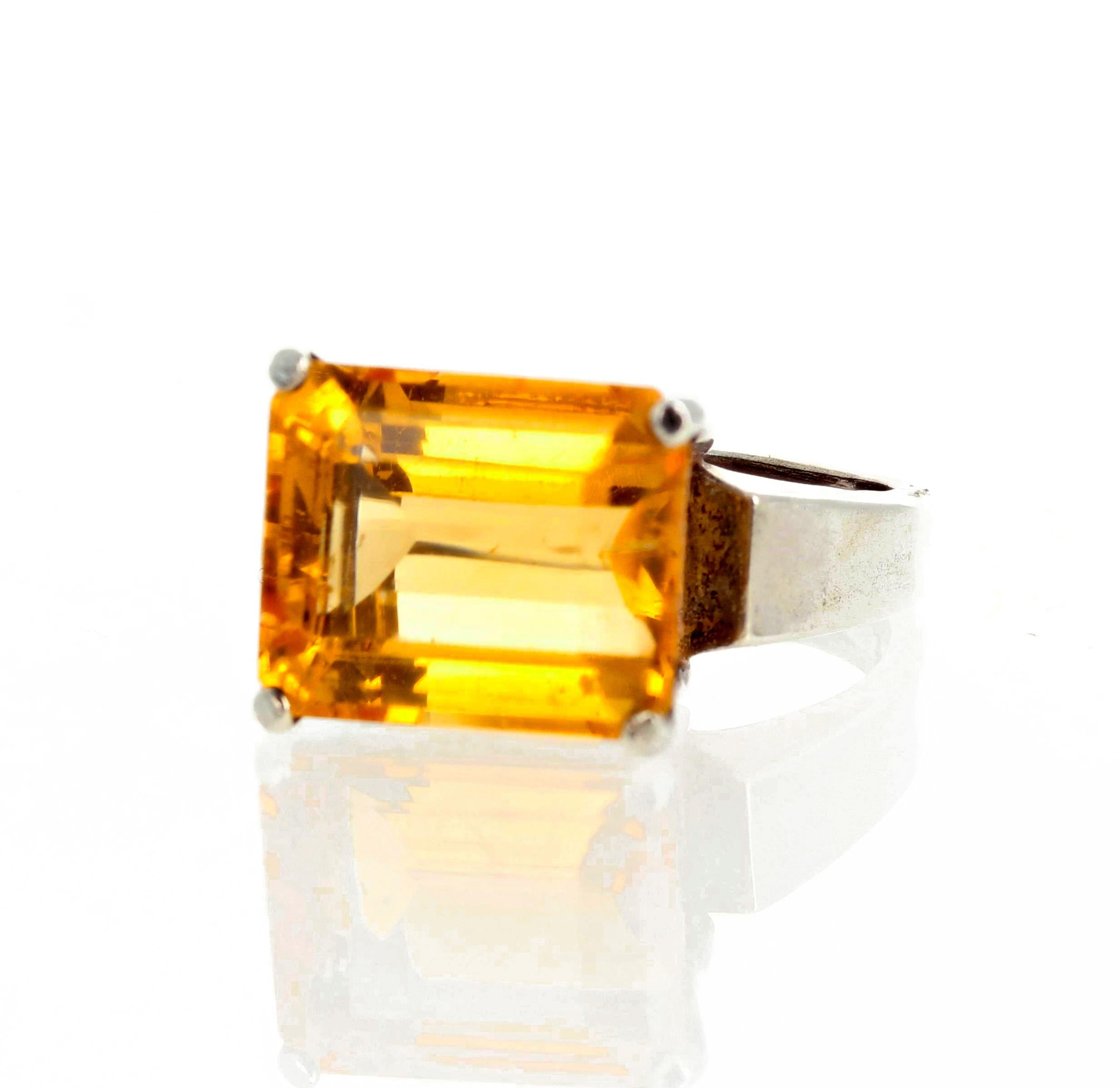 Glittering goldy yellow 5.5 carat natural cushion cut Citrine (8 mm x 10 mm) set in a sterling silver ring size 7 (sizable for free).  