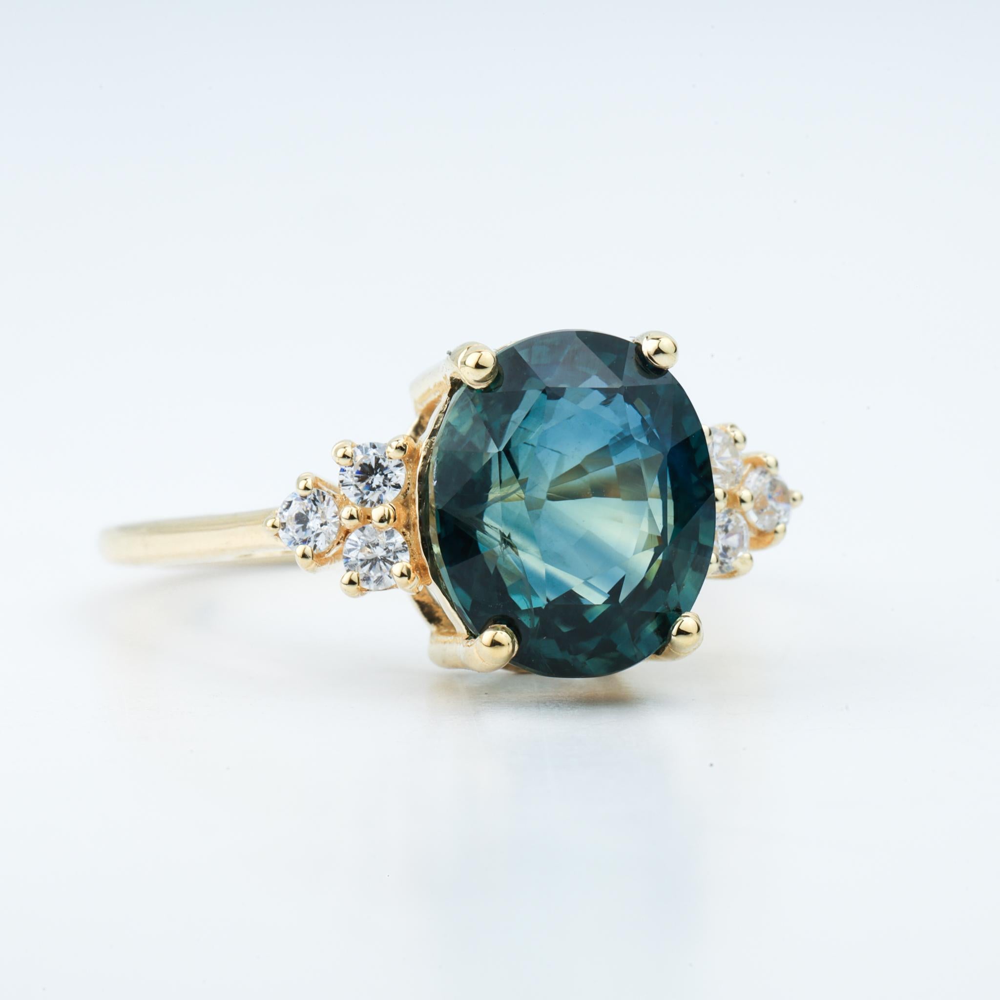 teal sapphire solitaire ring