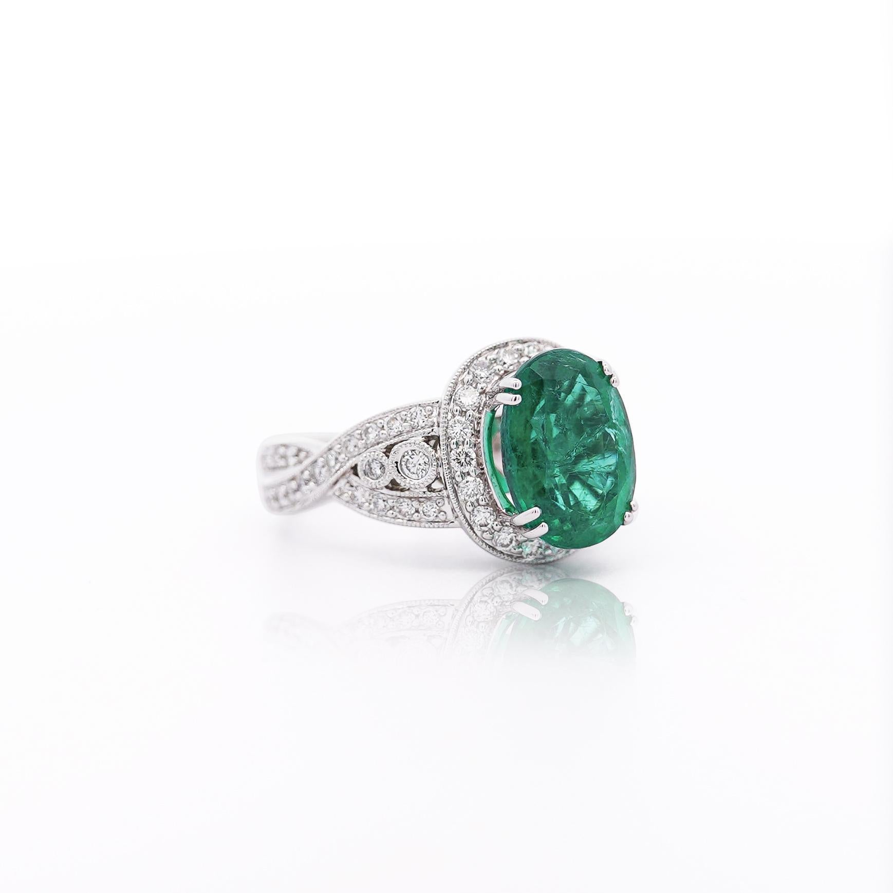 5.5 Carat Oval Cut Emerald & Diamond 18K White Gold Filigree Crossover Ring For Sale 5