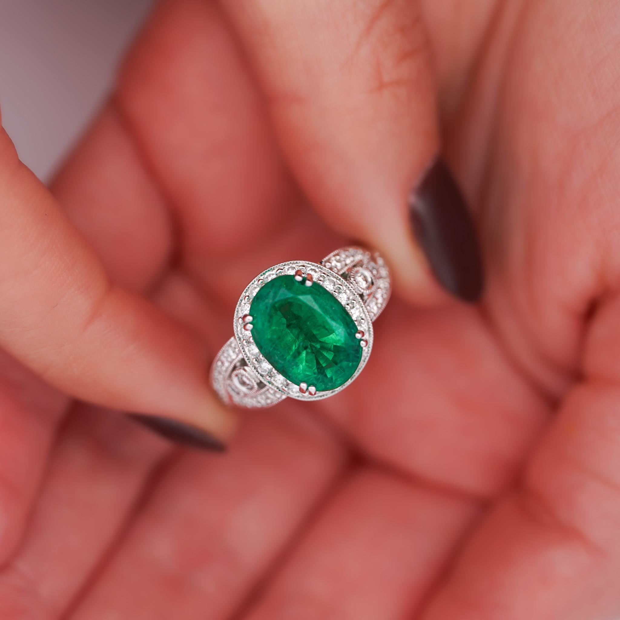 Women's 5.5 Carat Oval Cut Emerald & Diamond 18K White Gold Filigree Crossover Ring For Sale