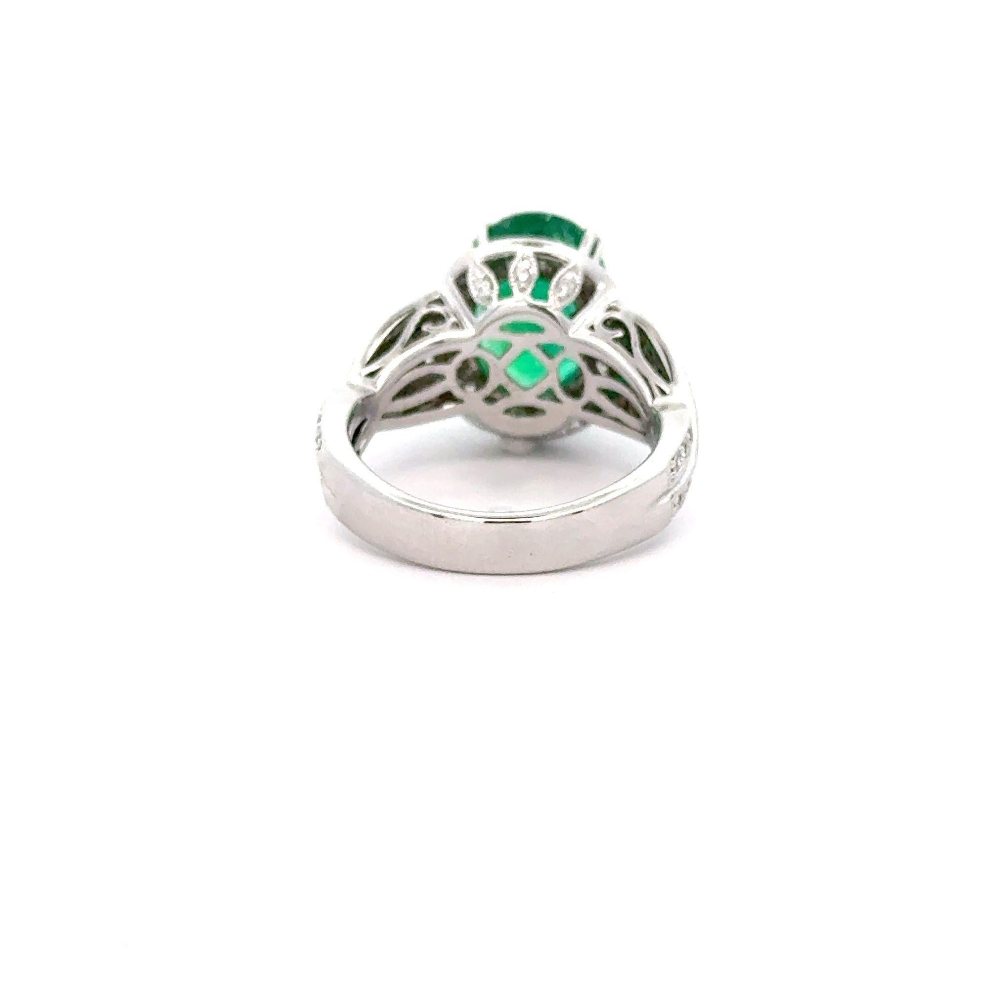 5.5 Carat Oval Cut Emerald & Diamond 18K White Gold Filigree Crossover Ring For Sale 1