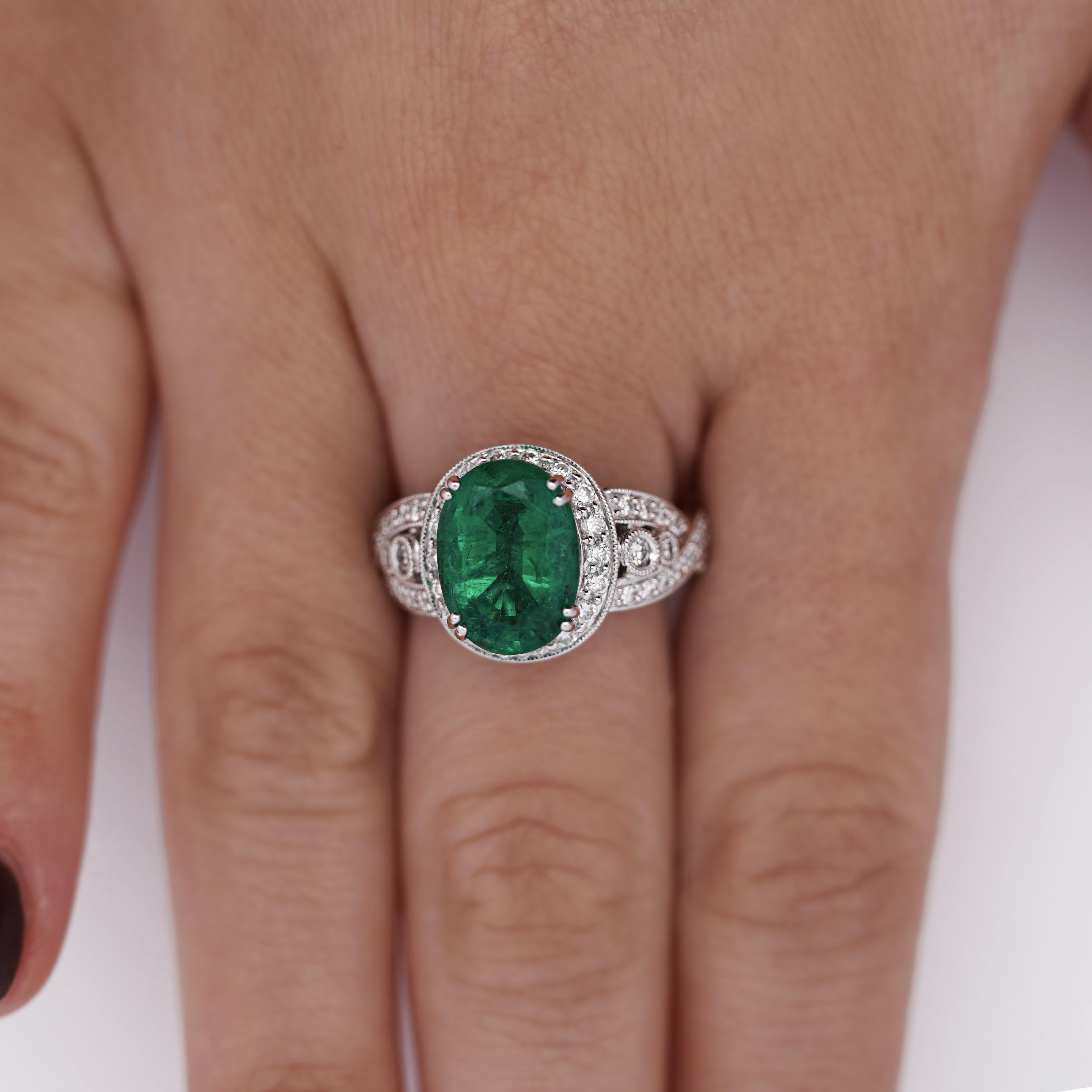 5.5 Carat Oval Cut Emerald & Diamond 18K White Gold Filigree Crossover Ring For Sale 3
