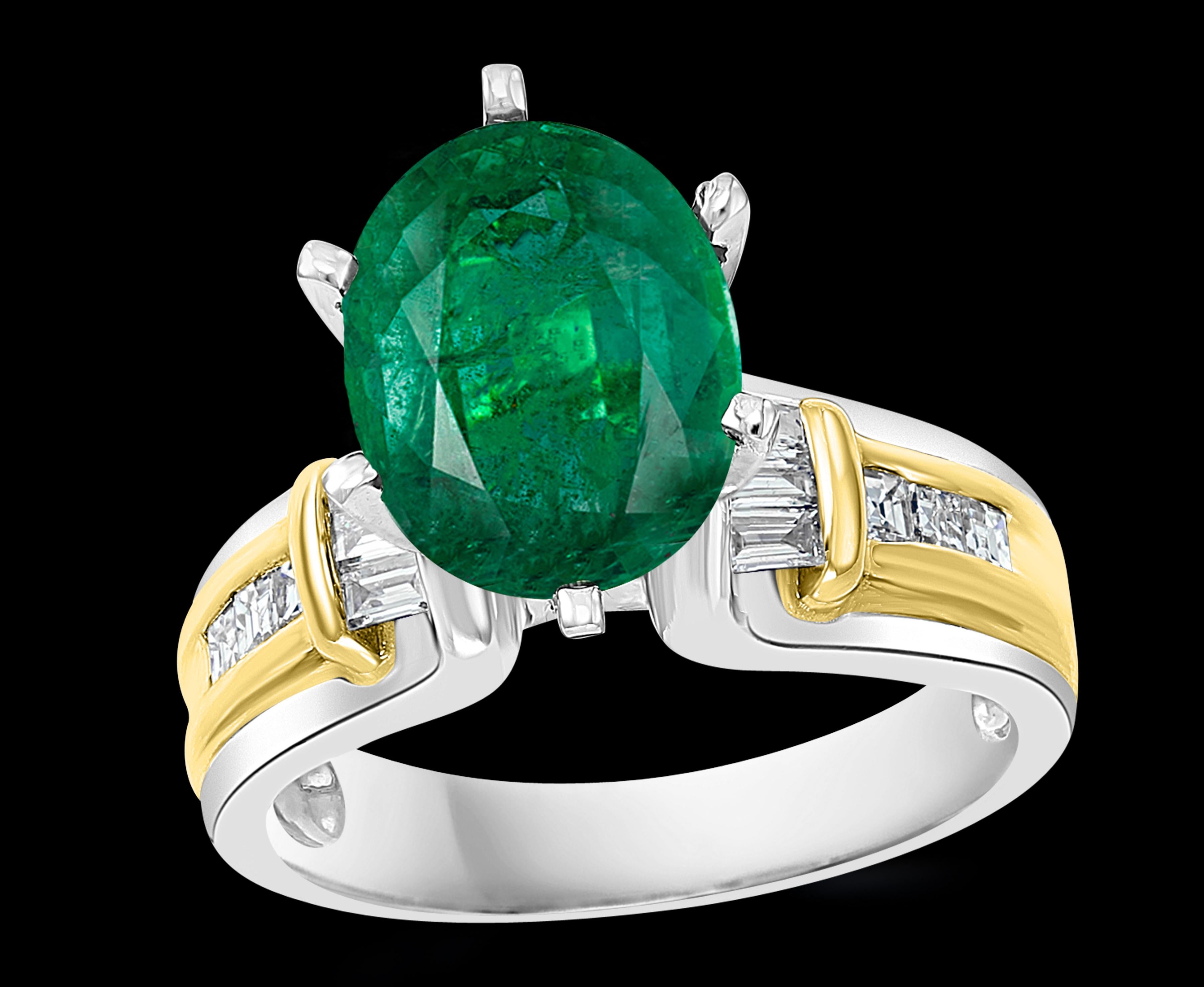 5.5 Carat Oval Cut Emerald  and Diamond in 18 Karat Two-Tone Gold Ring Estate
approximately 5.5  Carat  Emerald and Diamond Ring, Estate with  no color enhancement.
Gold: 18 Karat Yellow gold and Platinum : 12.3 Grams
Measurement of the emerald 12mm