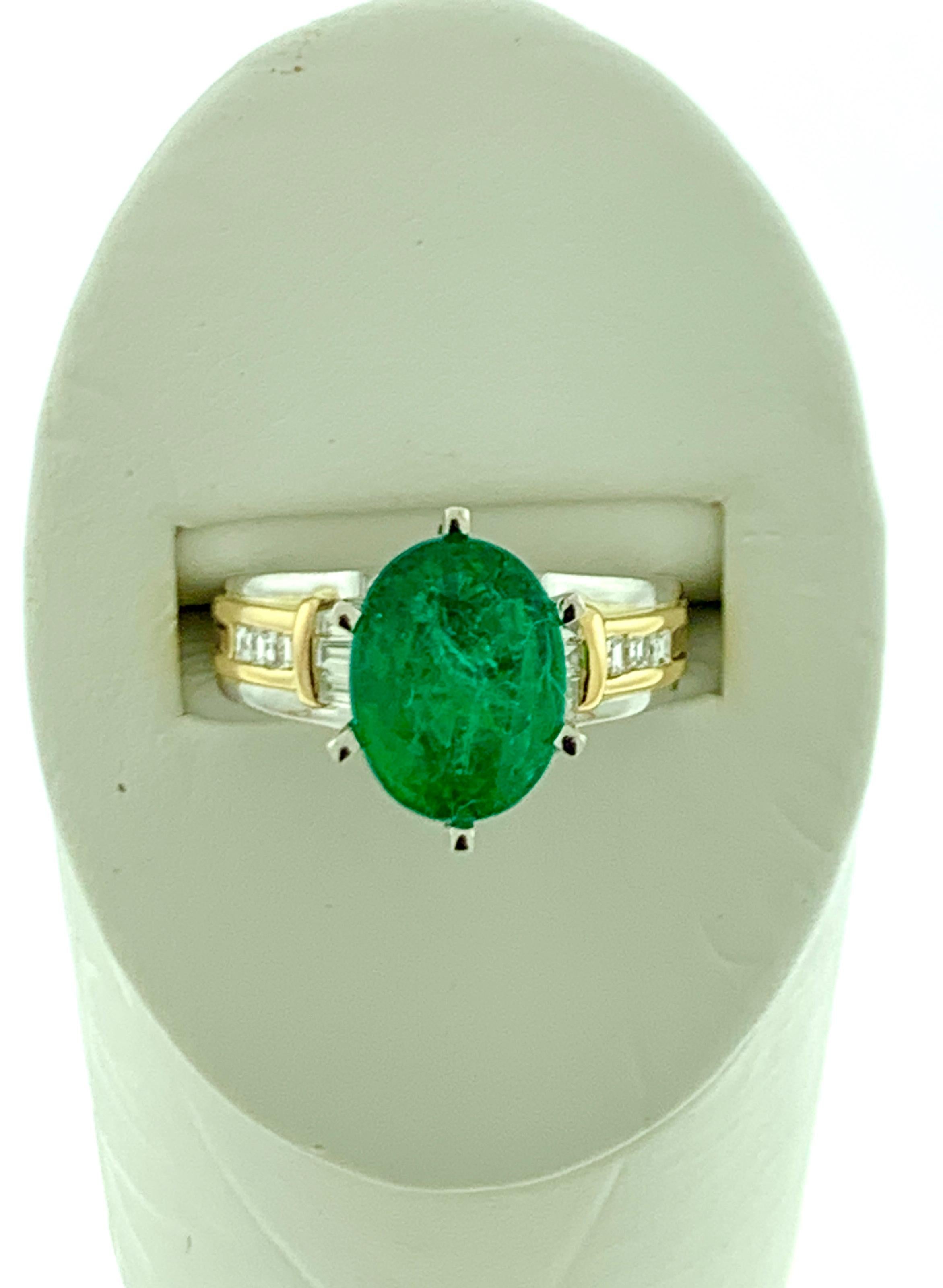 5.5 Carat Oval Cut Emerald and Diamond in 18 Karat/Platinum Two-Tone Ring Estate In Excellent Condition For Sale In New York, NY