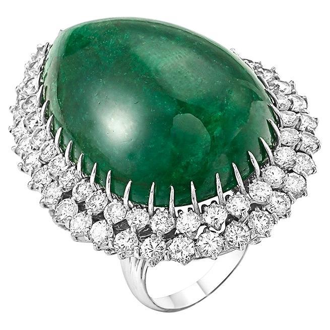 A classic, Cocktail ring convertible to Pendant 
55 Carat Pear Shape Emerald  Cabochon & 5.5 Ct Diamond Ring /pendant 14 Karat White Gold
 Approximately 5.5  Carats of Diamond , all are brilliant cut round diamonds
Estate  piece with no color