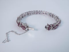 55 Karat Rubin-Blumenmotiv-Tennisarmband aus 14 Weißgold