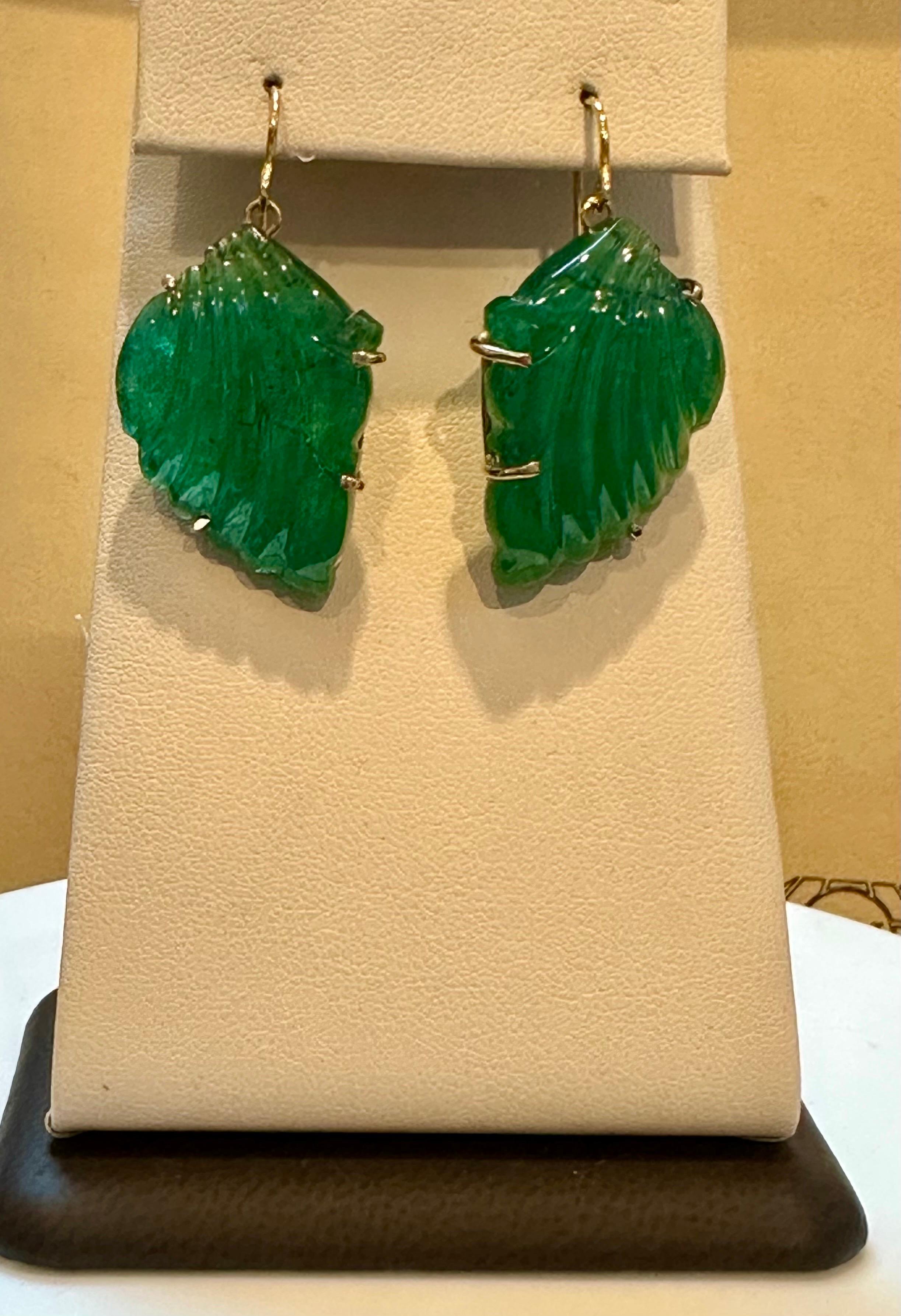 55 Ct Carved Emerald Leaf Shape Earrings 14 Kt Yellow Gold French Wire Earring For Sale 1