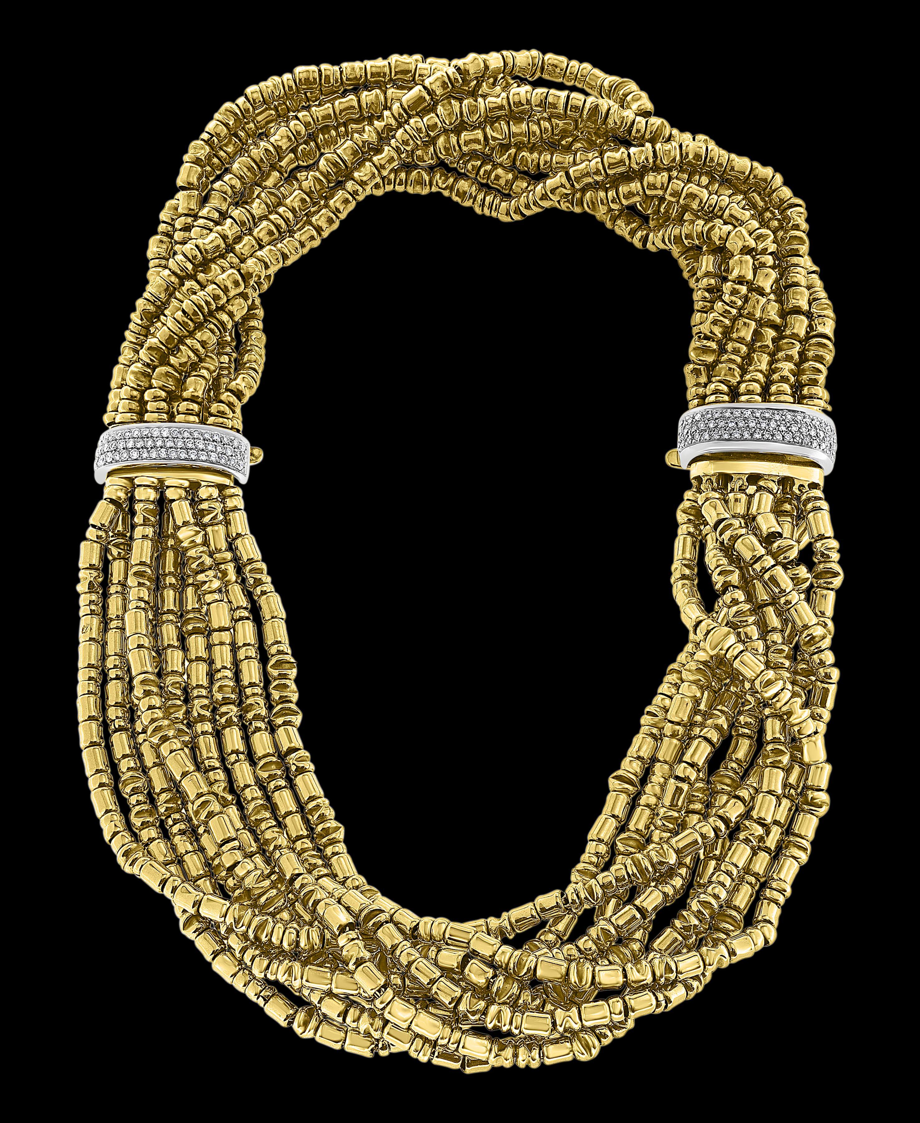 5.5 Ct Diamond Necklace / Bracelets 280 Gm 18 Karat Gold Designer  Orlando-Orlandini
One of our premium Neckalce  from our Bridal collection.
5.5 carats of VS quality of Diamonds all mounted in 18 karat yellow gold makes the two Clasps of the two