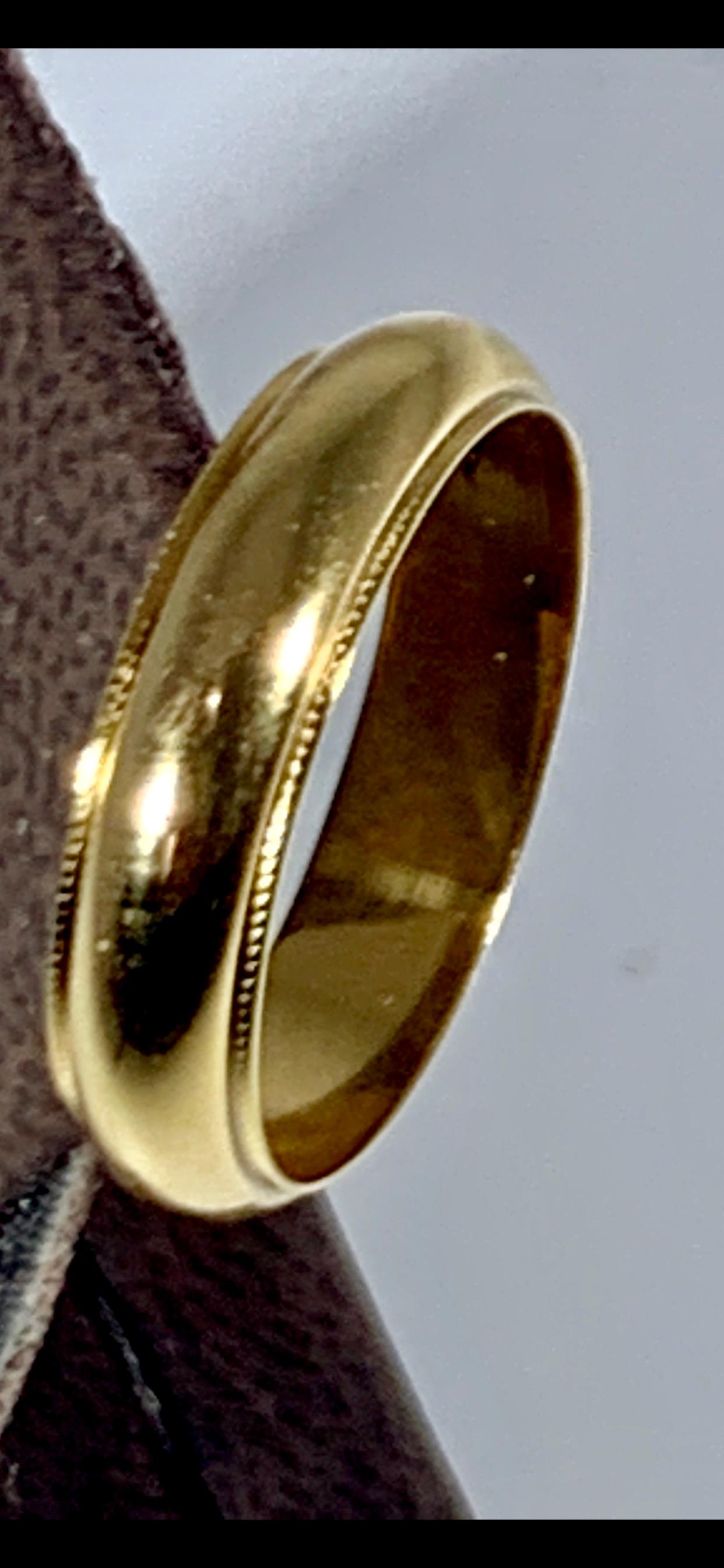 14 Karat Yellow Gold Wide 5.5 mm Plain Wedding Band Ring 6 Grams , Estate
This timeless style adds a step-down edge to each side of the classic domed band. Quality craftsmanship makes this long lasting band a great value. 
Milgrain-Edge Comfort-Fit