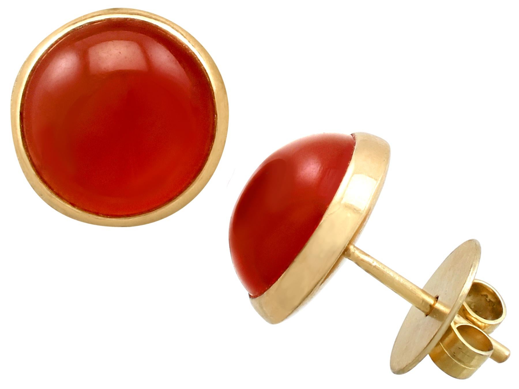 An impressive pair of vintage 1980s 5.50 carat agate and 18 karat yellow gold stud earrings; part of our diverse gemstone jewelry and estate jewelry collections.

These fine and impressive vintage cabochon cut earrings have been crafted in 18k