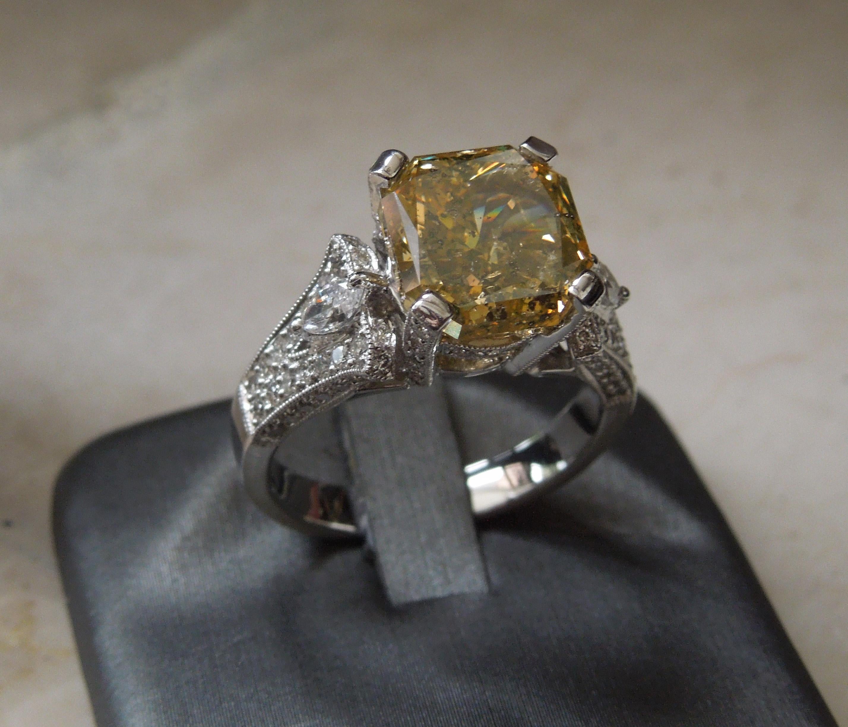 5.50 Carat Asscher Cut Golden Canary G.I.A. Diamond Ring In Good Condition For Sale In METAIRIE, LA