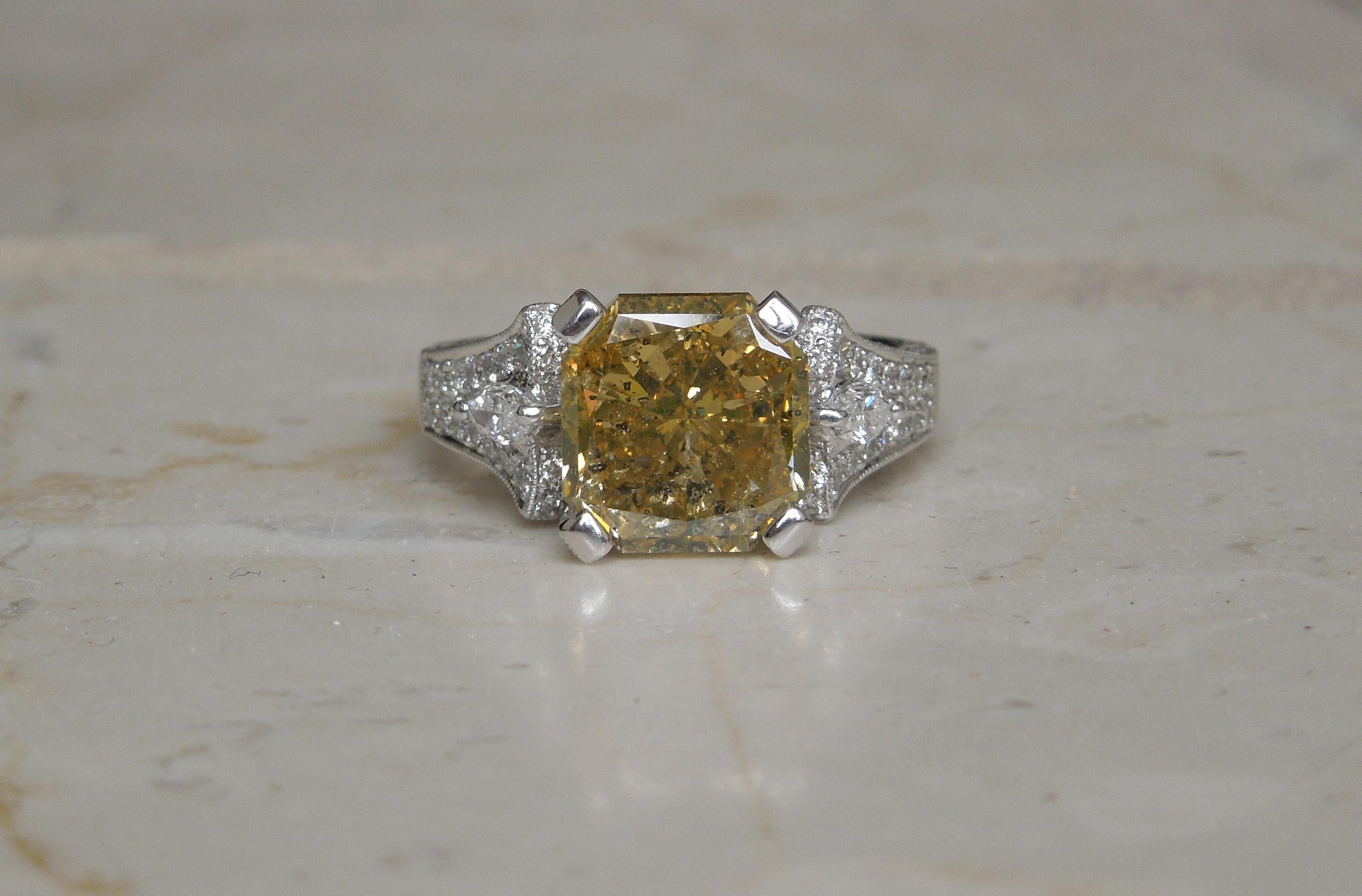 5.50 Carat Asscher Cut Golden Canary G.I.A. Diamond Ring  For Sale