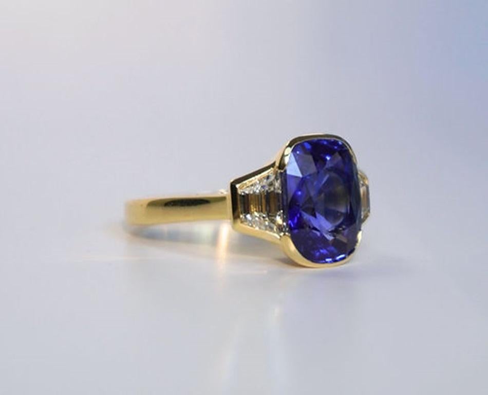 Sapphire Weight: 5.50 ct, Diamond Weight: 1.05 ct (I-VS), Metal: 18K Yellow Gold, Ring Size: 6.5, Shape: Cushion, Color: Blue, Hardness: 9, Birthstone: September, CD Certified