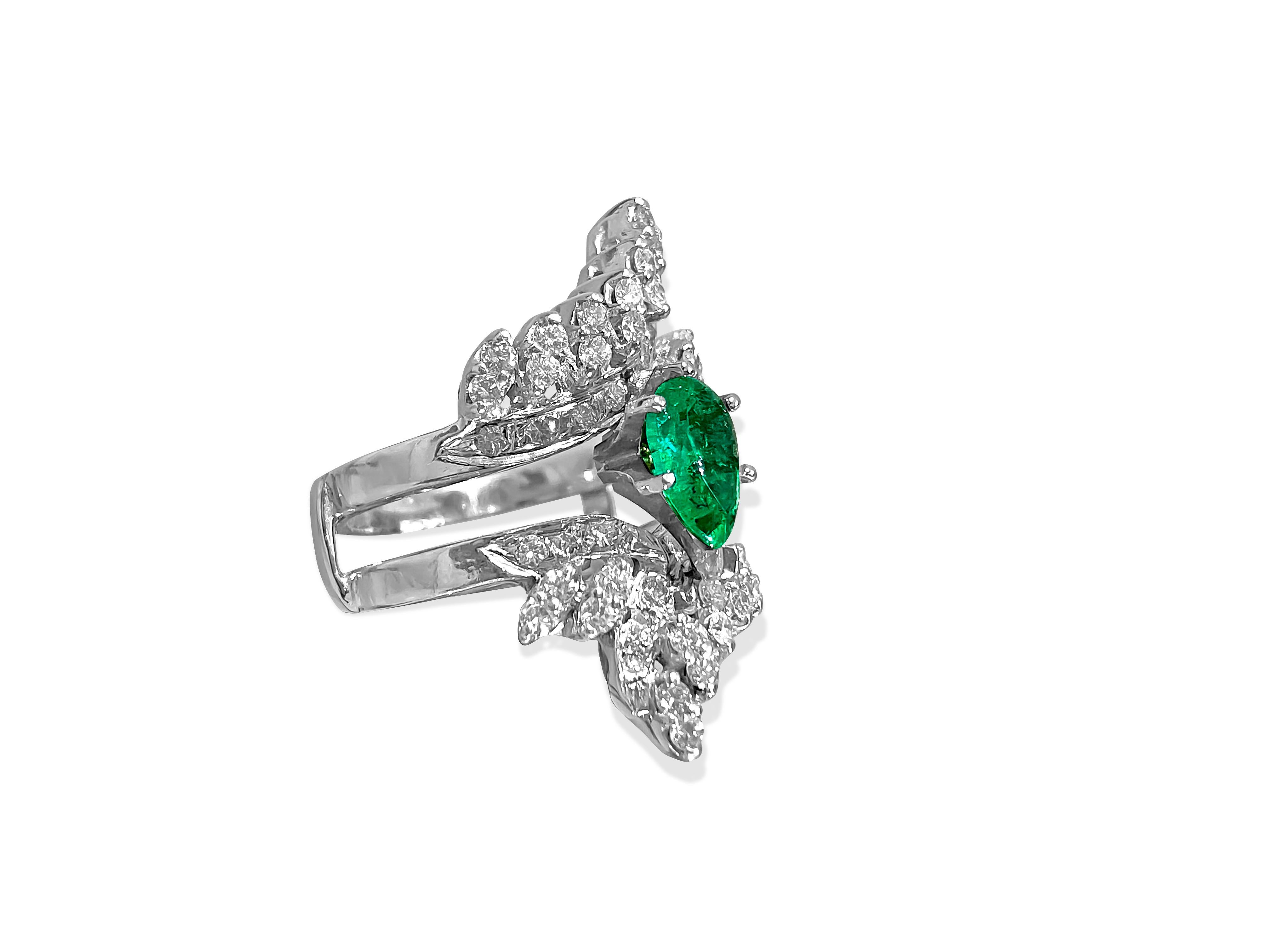 Metal: 14k white gold. 

100% natural earth minded, 3.50 carat Colombian emerald. Pear shape emerald set in prongs. 

2.00 carat weight total diamonds. VS-SI clarity and G color diamonds.

Ring size: US 6.50
Free ring resizing available.
