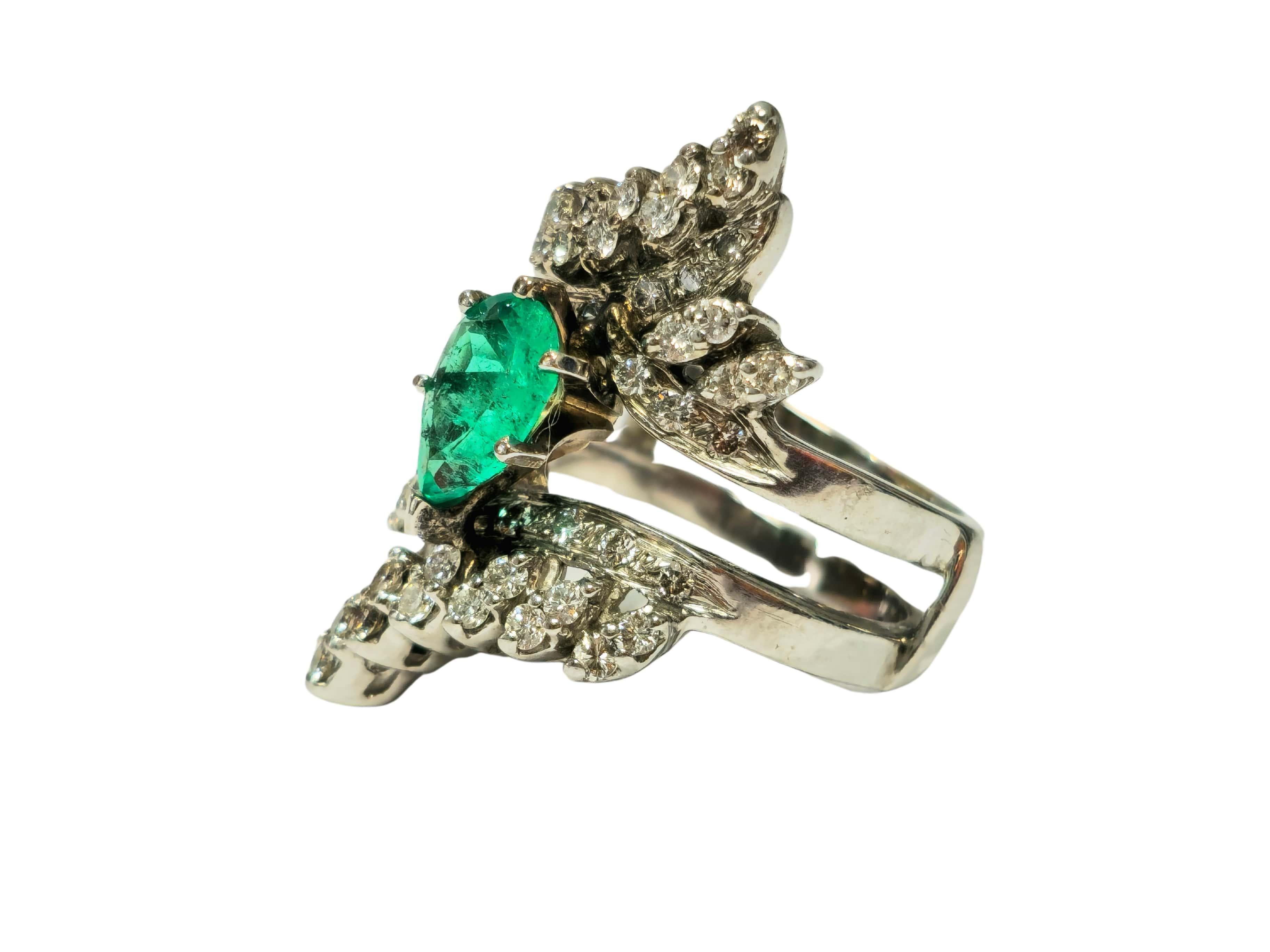 Crafted in lustrous 14k white gold, this stunning ring boasts a magnificent 3.50 carat Colombian emerald, pear-shaped and elegantly set in prongs, exuding natural beauty and allure. Complementing the emerald are brilliant diamonds totaling 2.00