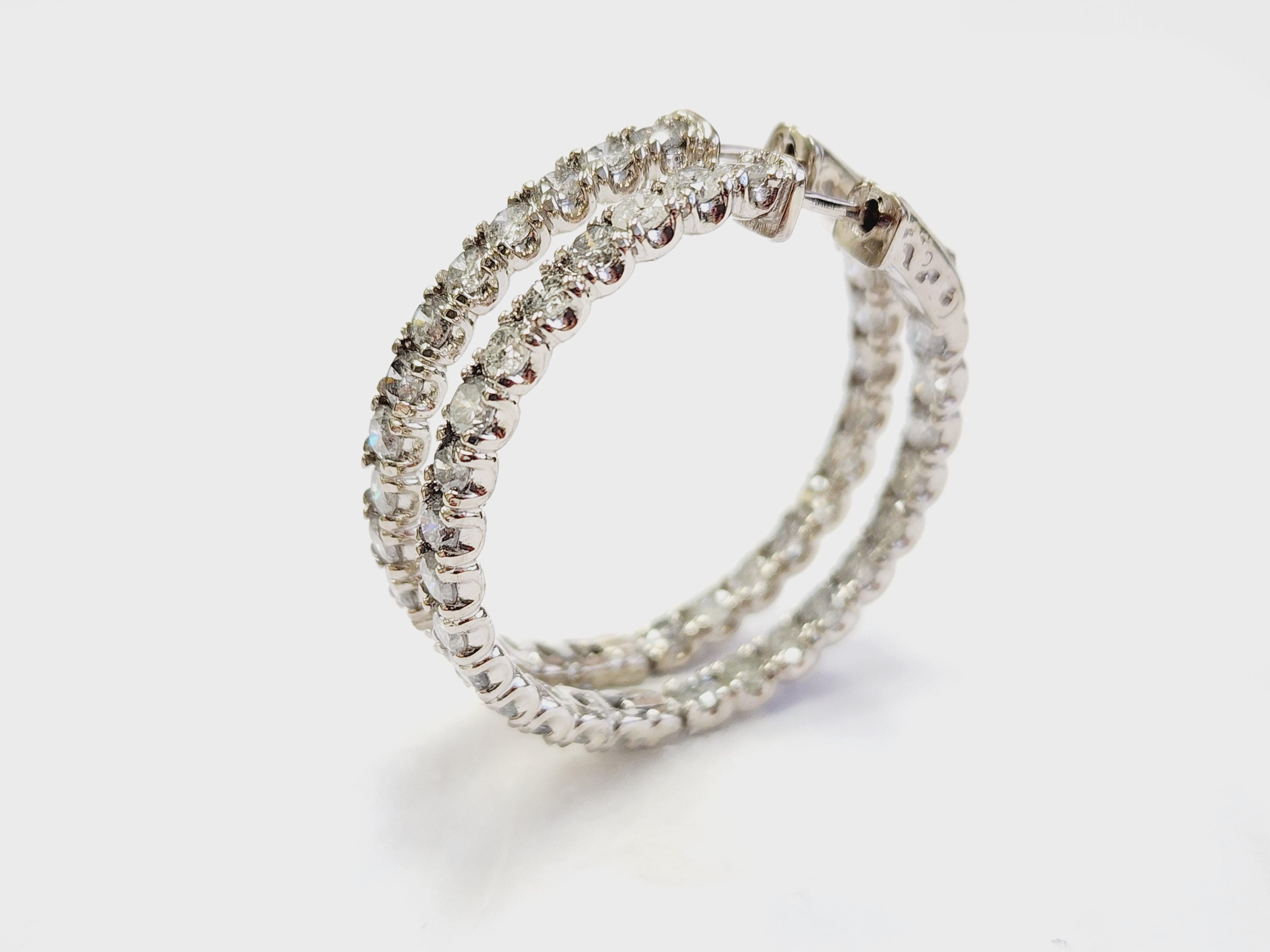 Beautiful Inside-Out Natural Diamond Hoop Earrings in 14K White Gold
Elevate your elegance with these stunning 1.25-inch diameter inside-out hoop earrings, crafted in lustrous 14K white gold. Each hoop features a dazzling array of natural diamonds,