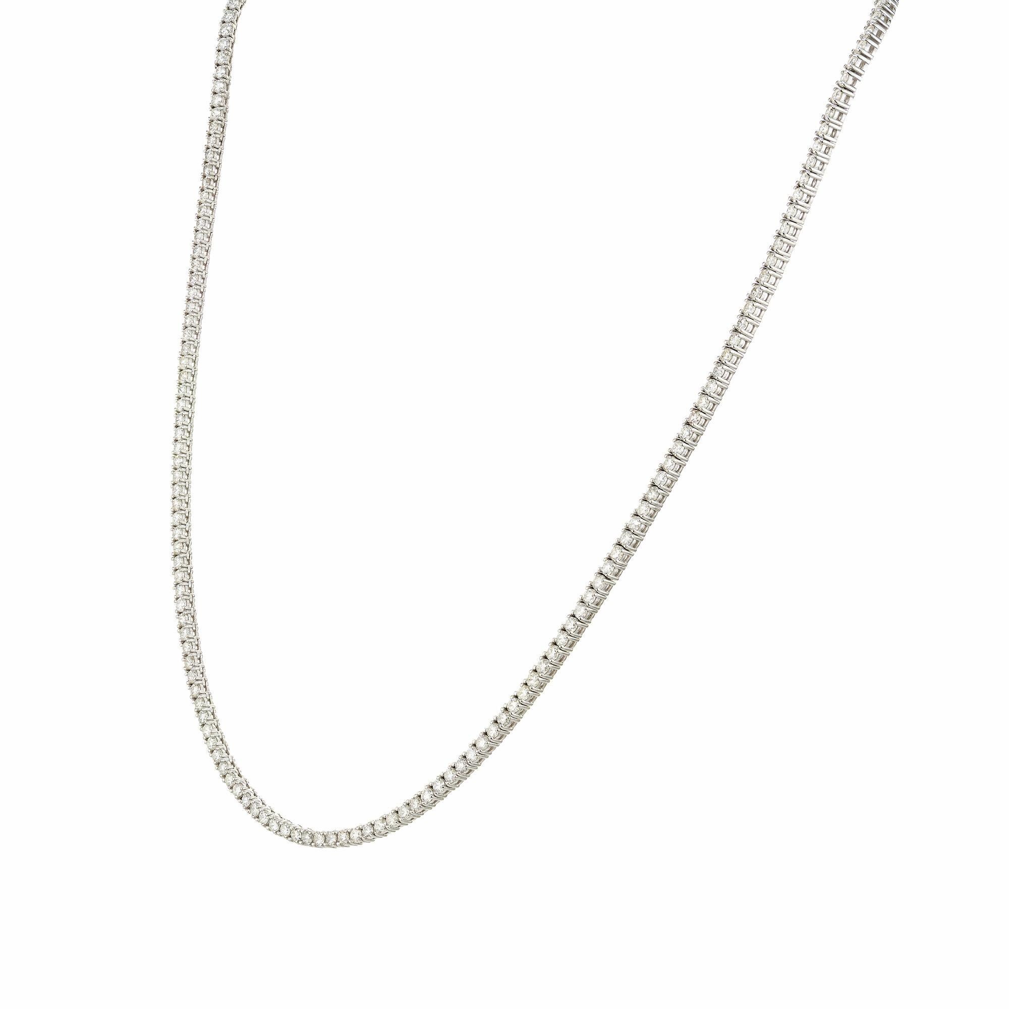 Classic diamond tennis necklace. 5.50 Carats of sparkly full cut diamonds. This necklace features a stunning array of 187 round brilliant diamonds, meticulously set in a sleek 14 white gold chain. The clasp has a secure safety catch. The white gold