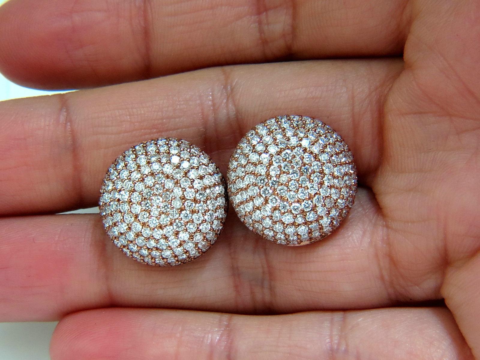 Bead set Button domed puff cluster earrings.

Gorgeous brilliance.

5.50ct. Round, Full cut diamonds

 G-color, Vs-2 clarity.

Bead set (pave) by hand.

Overall:

3/4 inch diameter

.31 inch depth

comfortable and secure omega clip

11.1