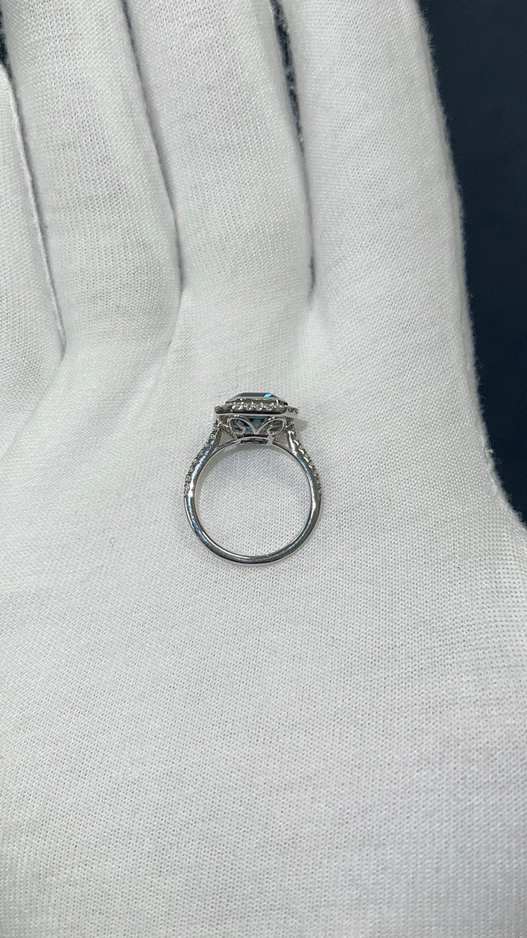 5.50 Carat Elegant Elongated Emerald Cut London Blue Topaz Ring with 0.56ct Total Diamond Weight (F/G VS) 

Set in an expertly crafted 14K White Gold Comfort Fit setting.

Ring Size 6.5