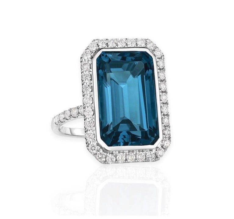 Modern 5.50 Carat Elongated Emerald Cut London Blue Topaz Ring 14K For Sale