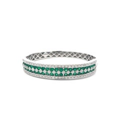 Armreif 14K WG mit 5,50 Karat Smaragd und 1,50 Karat rundem Brillanten